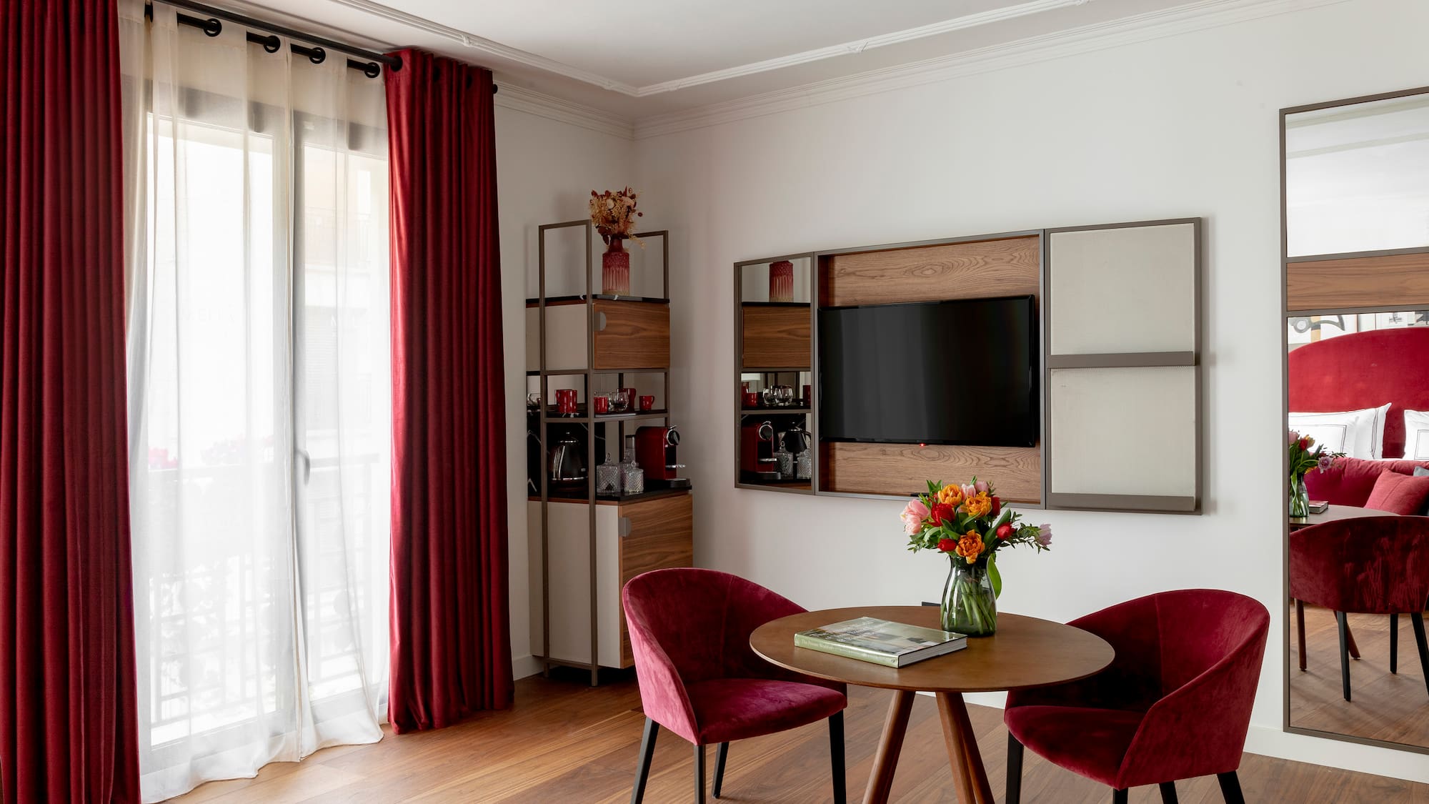 a room with a table and chairs