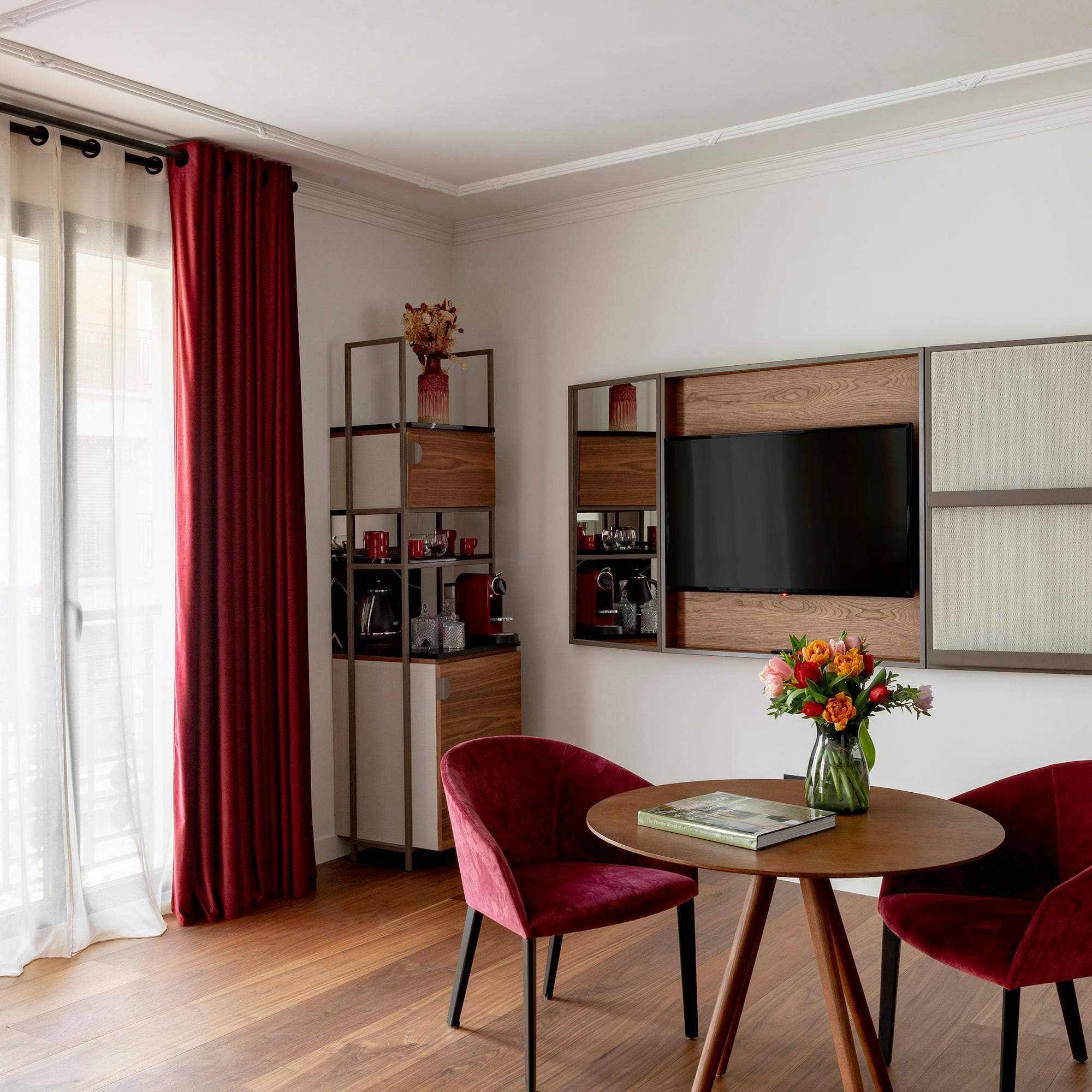 a room with a table and chairs