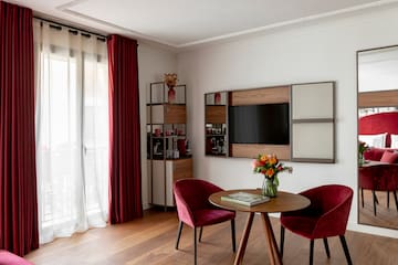 a room with a table and chairs