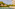 Luxury tropical resort pool, two palapa cabanas, and hotel building.