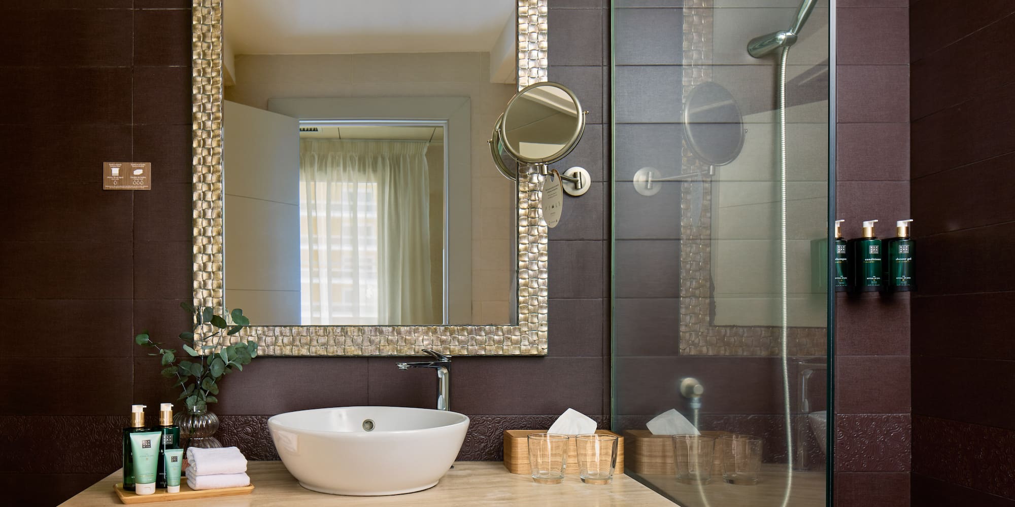 a bathroom with a mirror and sink