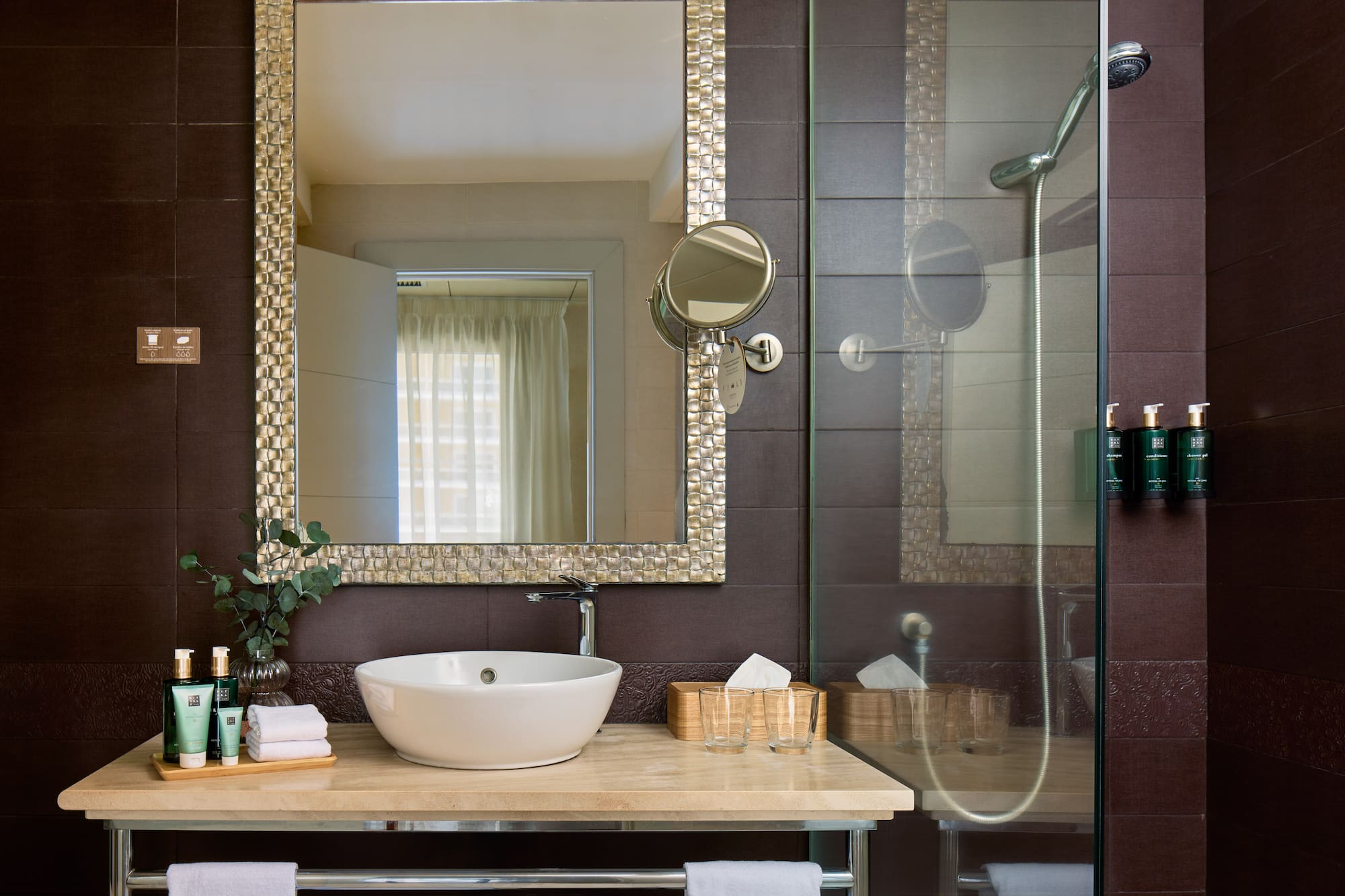 a bathroom with a mirror and sink