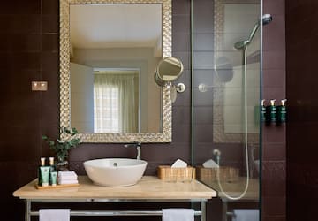 a bathroom with a mirror and sink