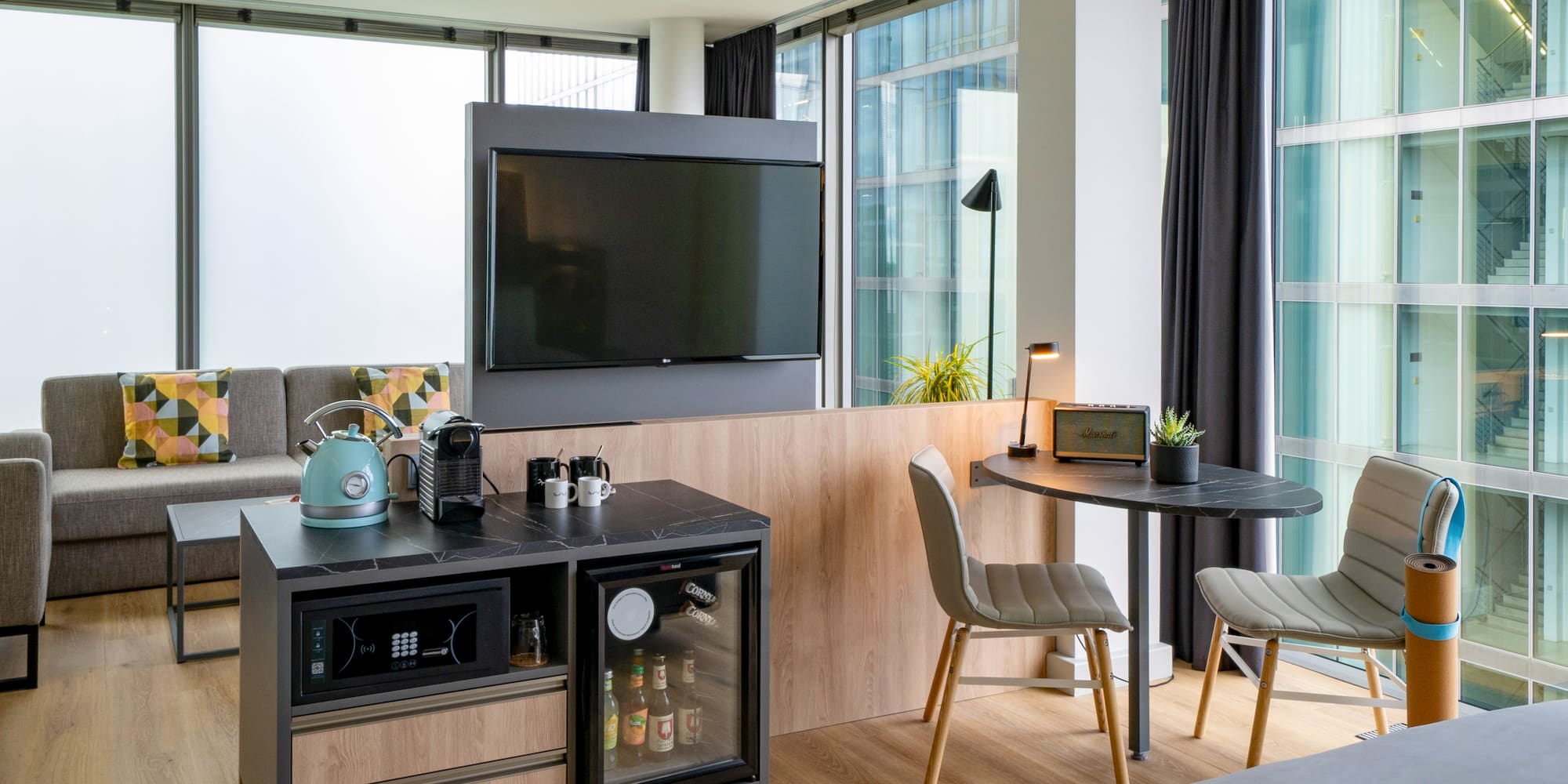 a room with a tv and a table