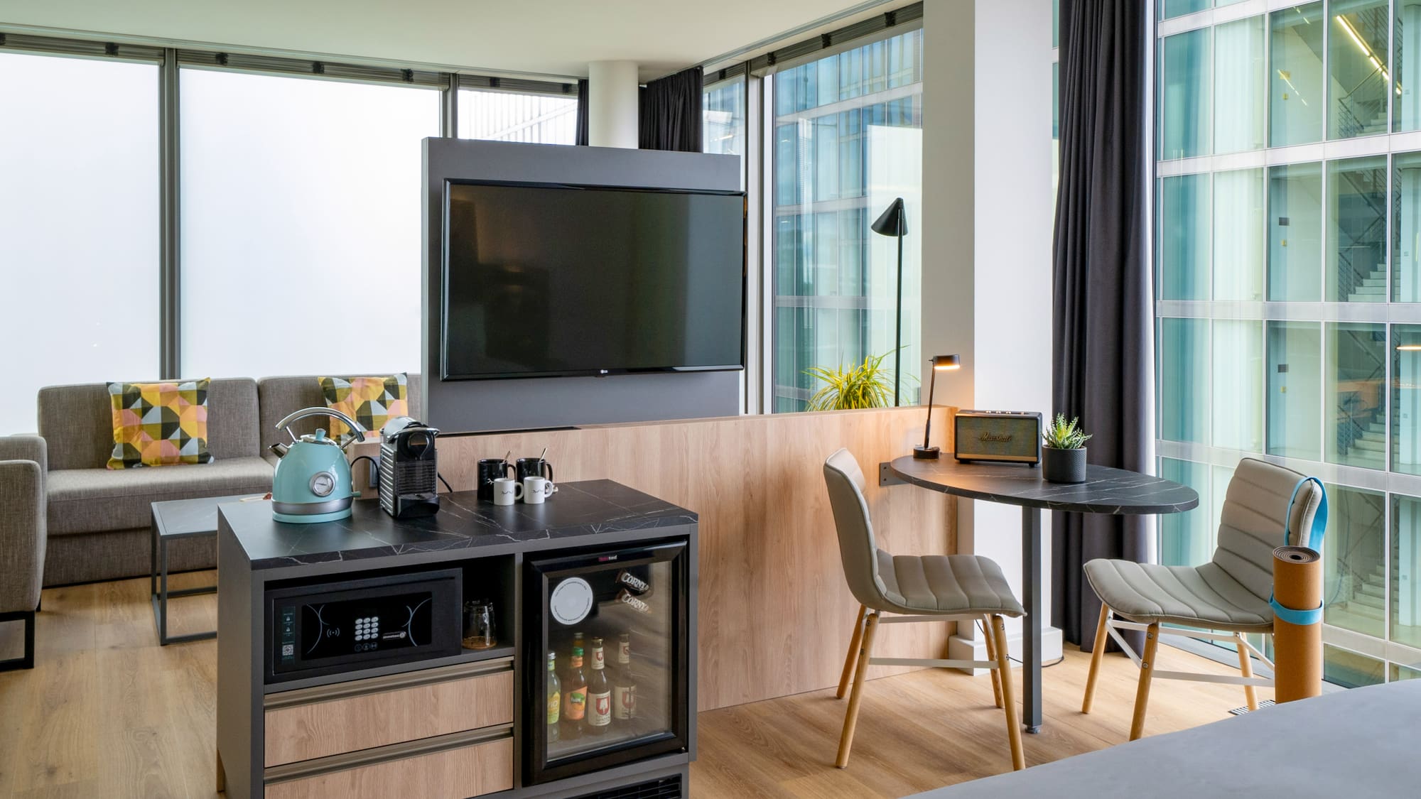 a room with a tv and a table