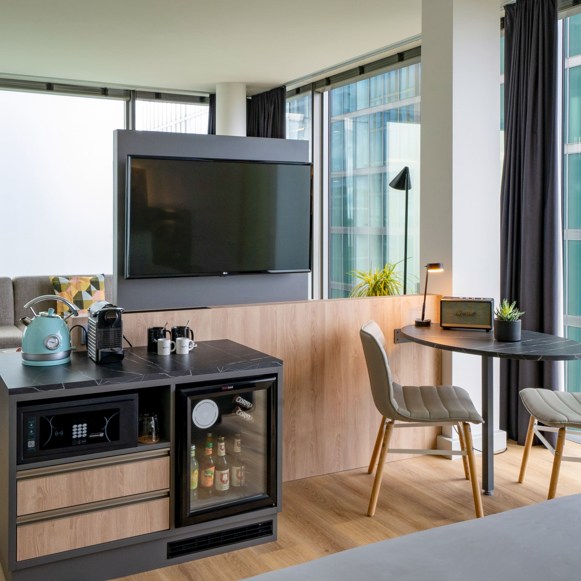 a room with a tv and a table