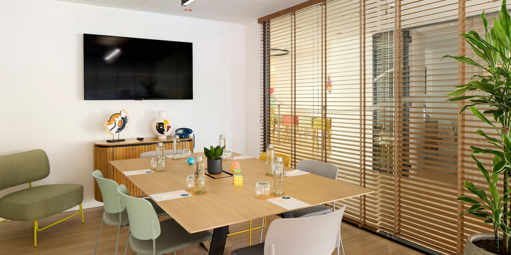 a room with a table and chairs