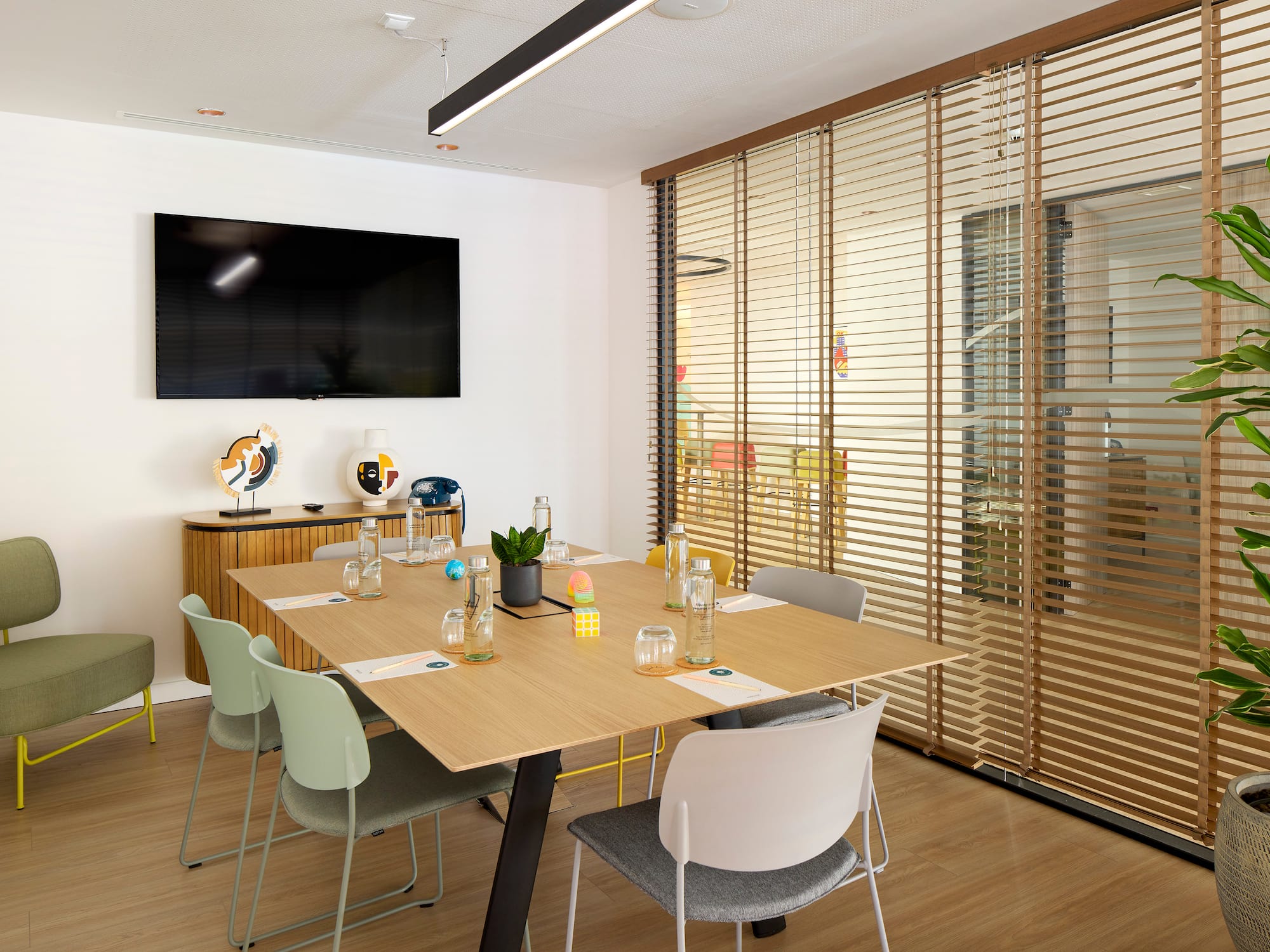 a room with a table and chairs