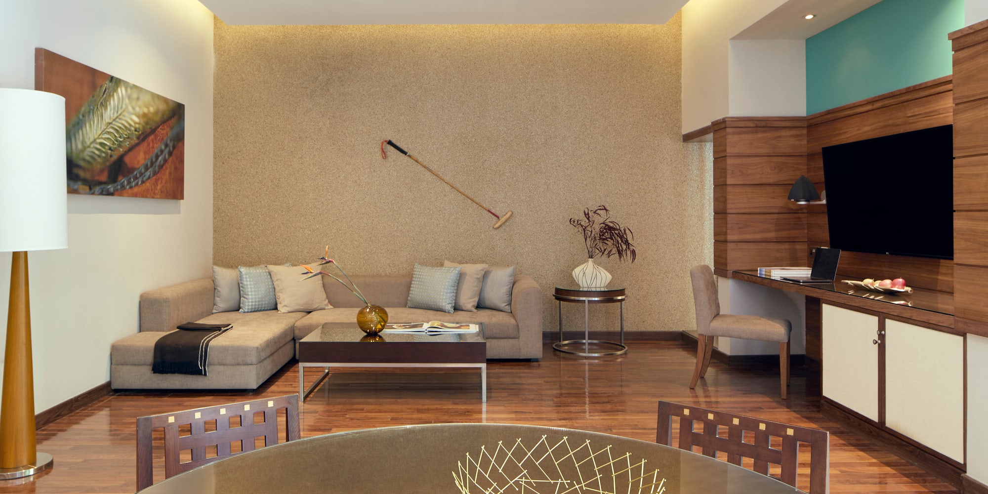 a living room with a table and couch