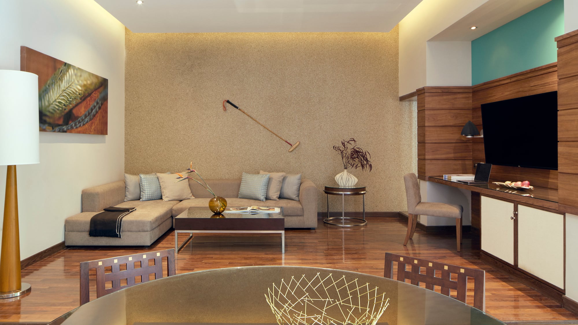 a living room with a table and couch