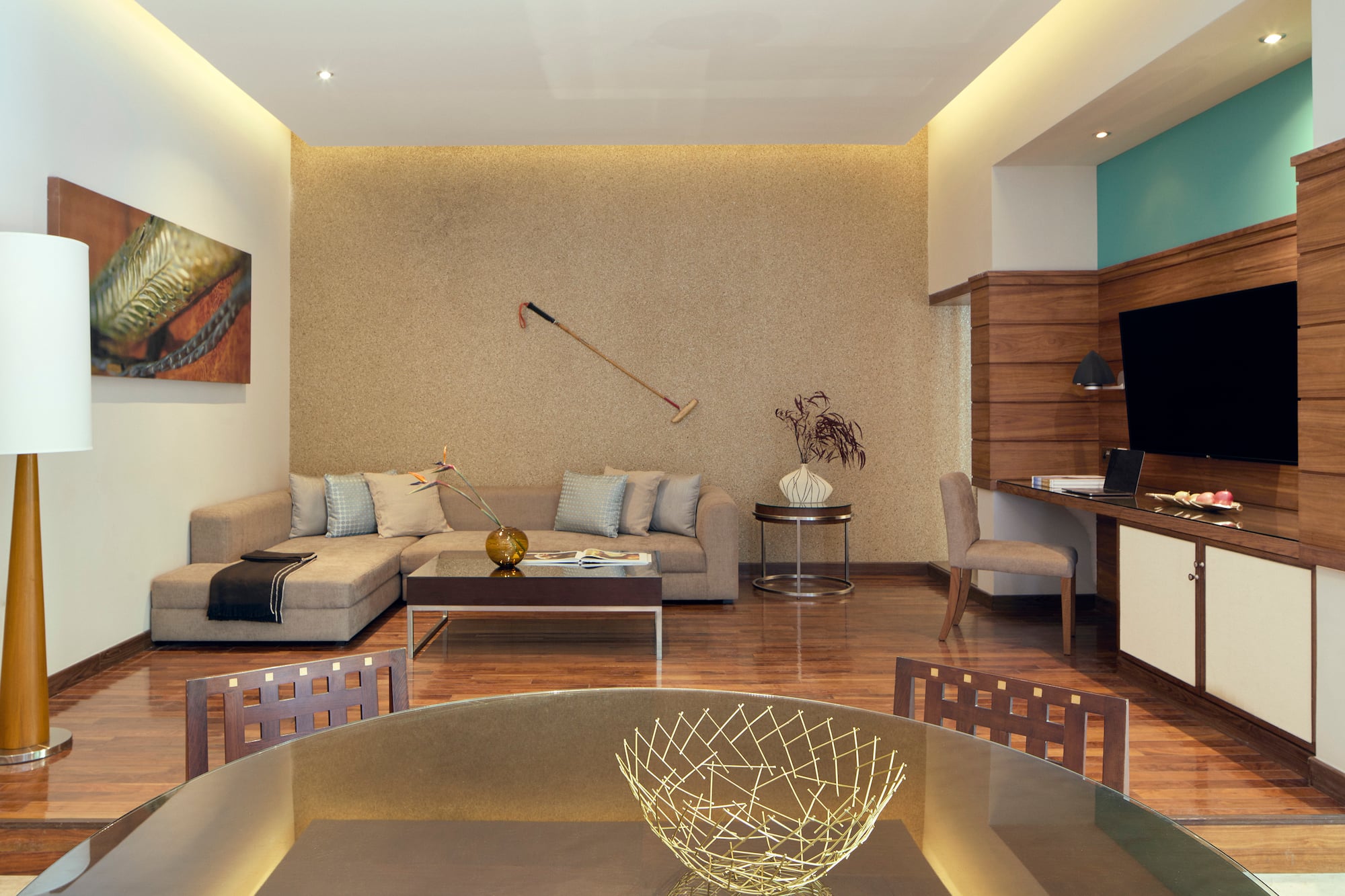 a living room with a table and couch