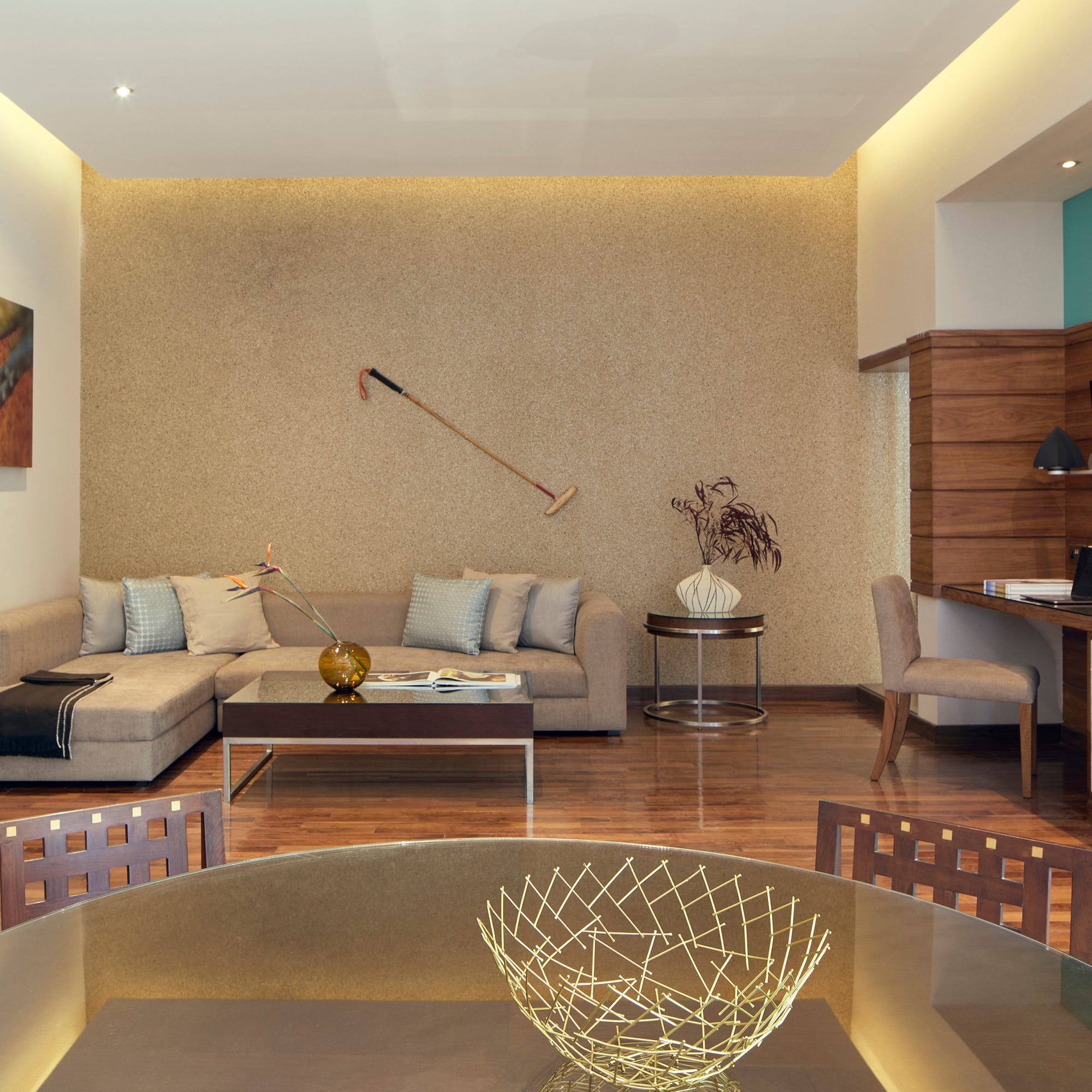 a living room with a table and couch