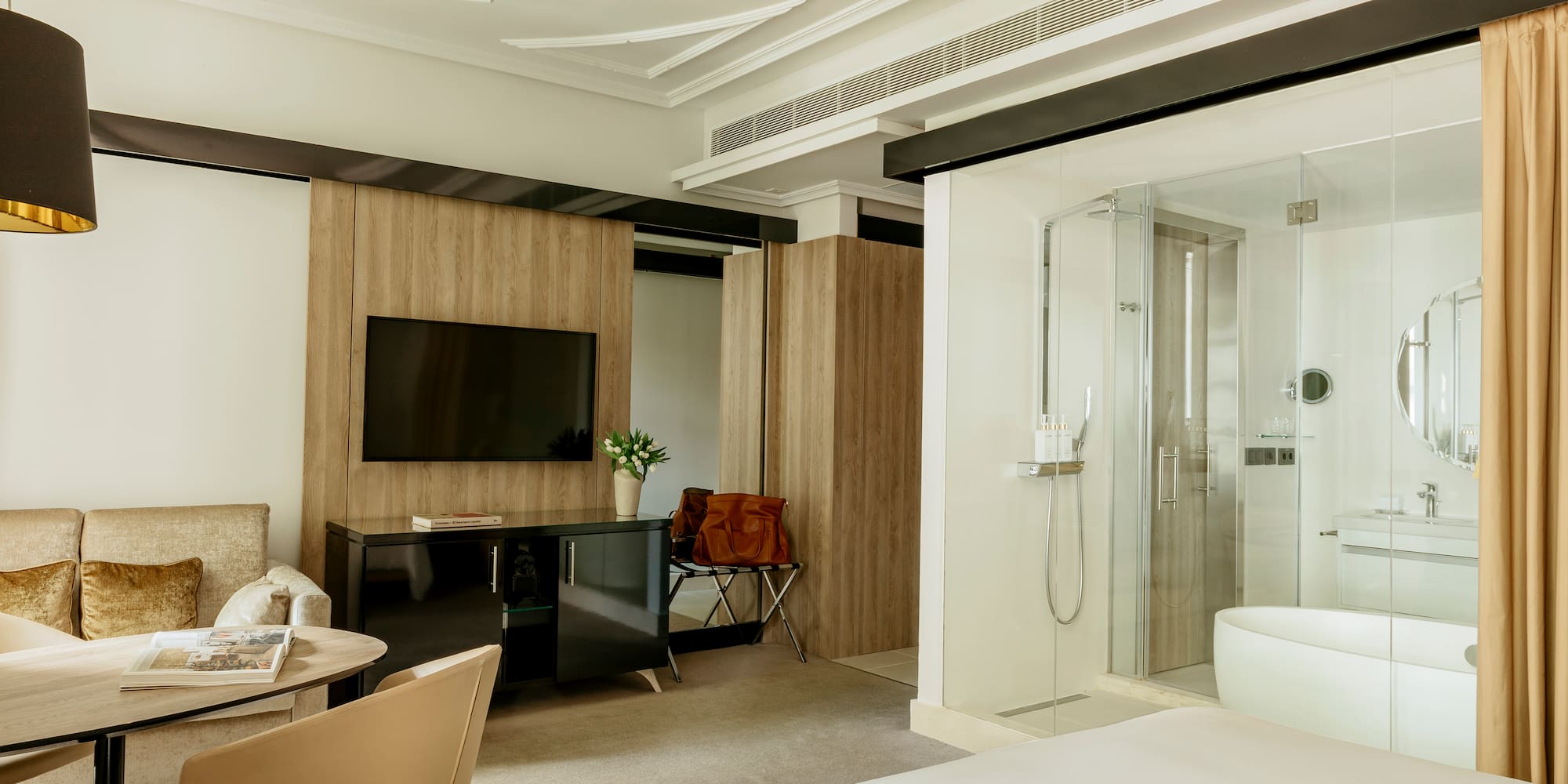 a room with a bed and a tv