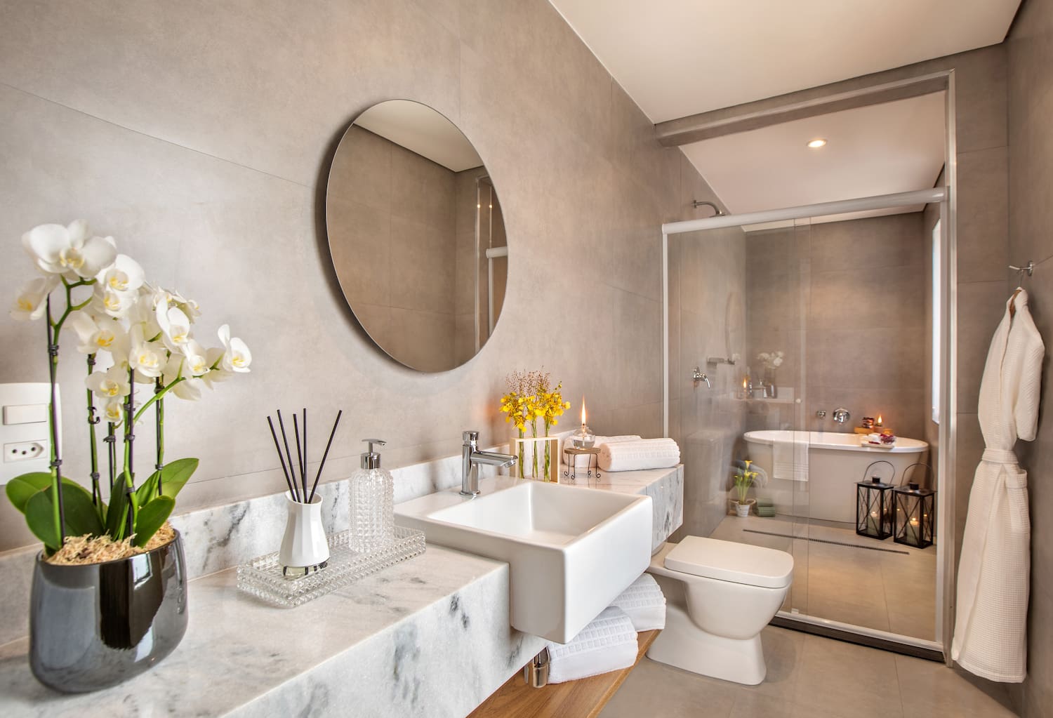 a bathroom with a mirror and sink