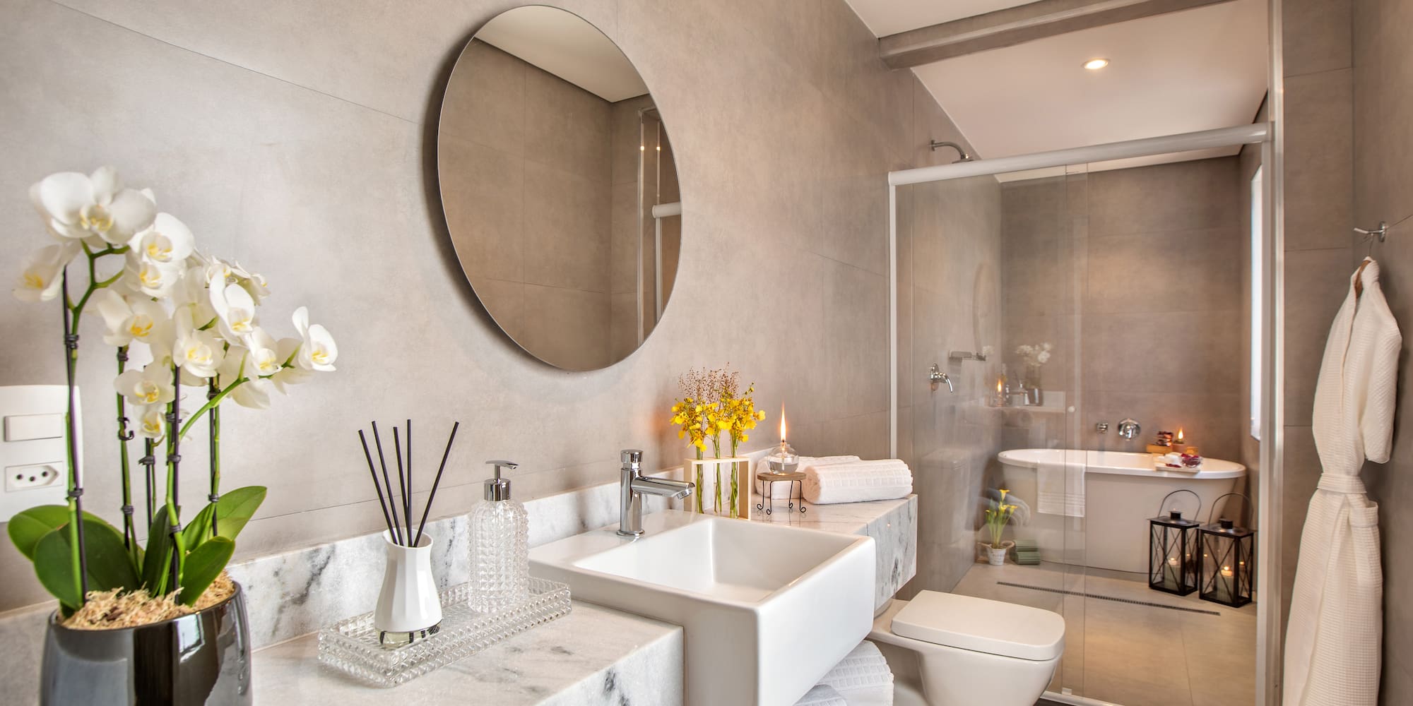 a bathroom with a mirror and sink