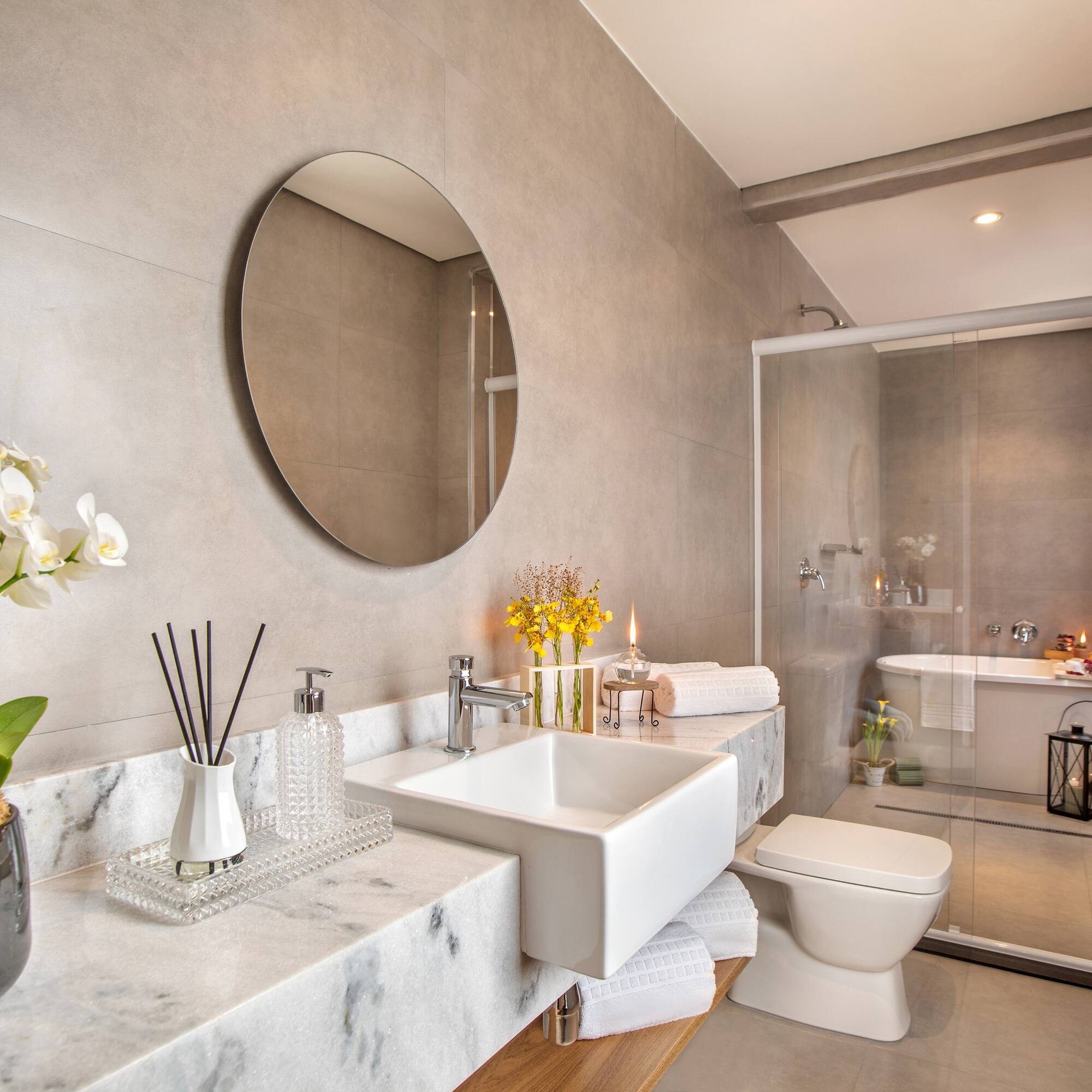 a bathroom with a mirror and sink