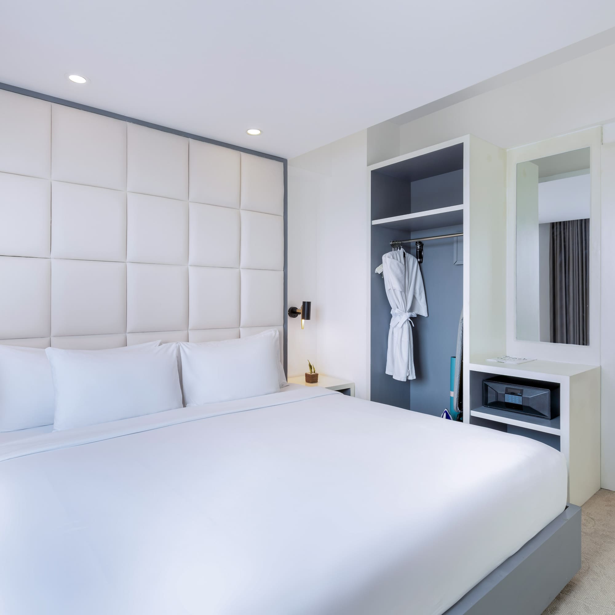 a white bed in a room