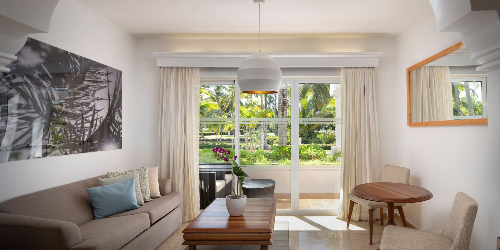 a living room with a couch and table