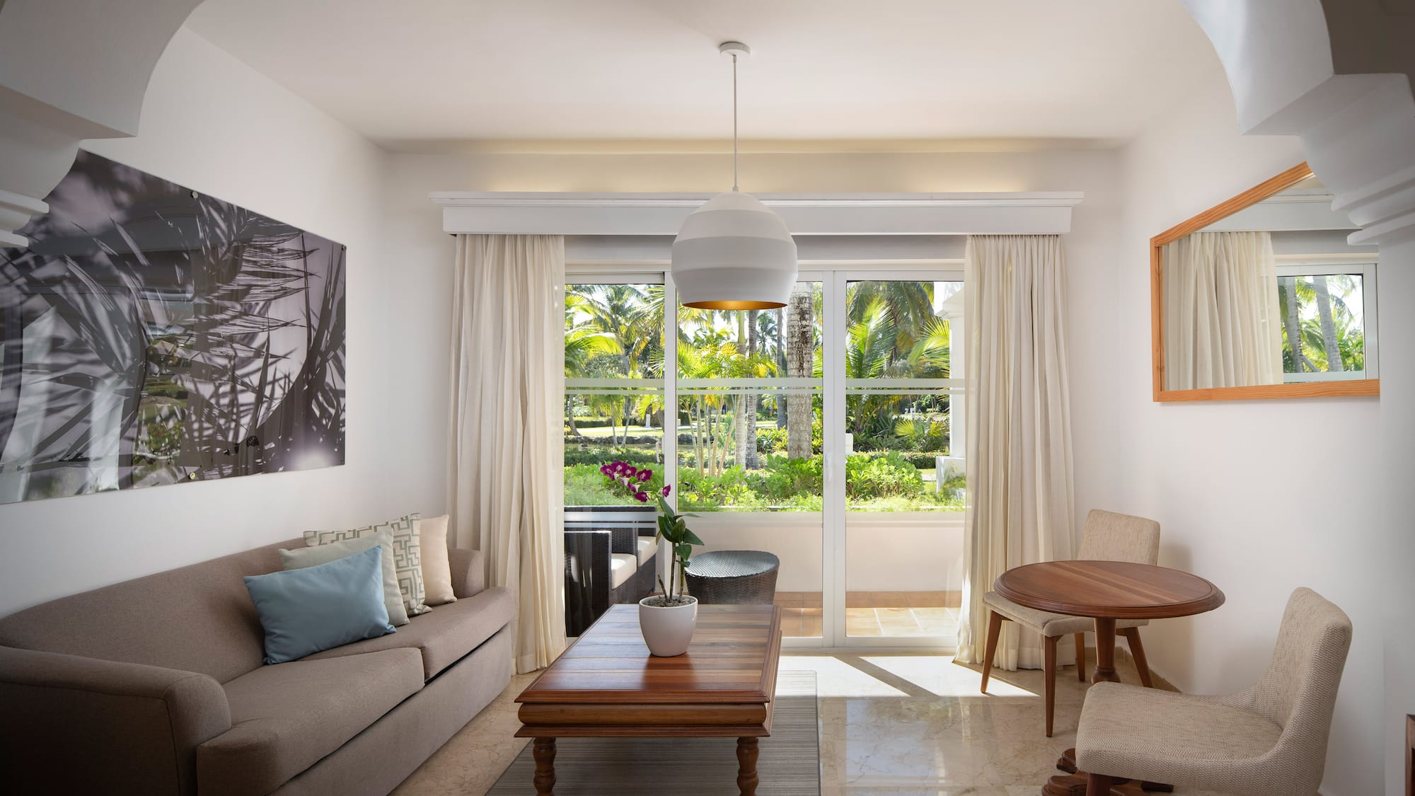 a living room with a couch and table