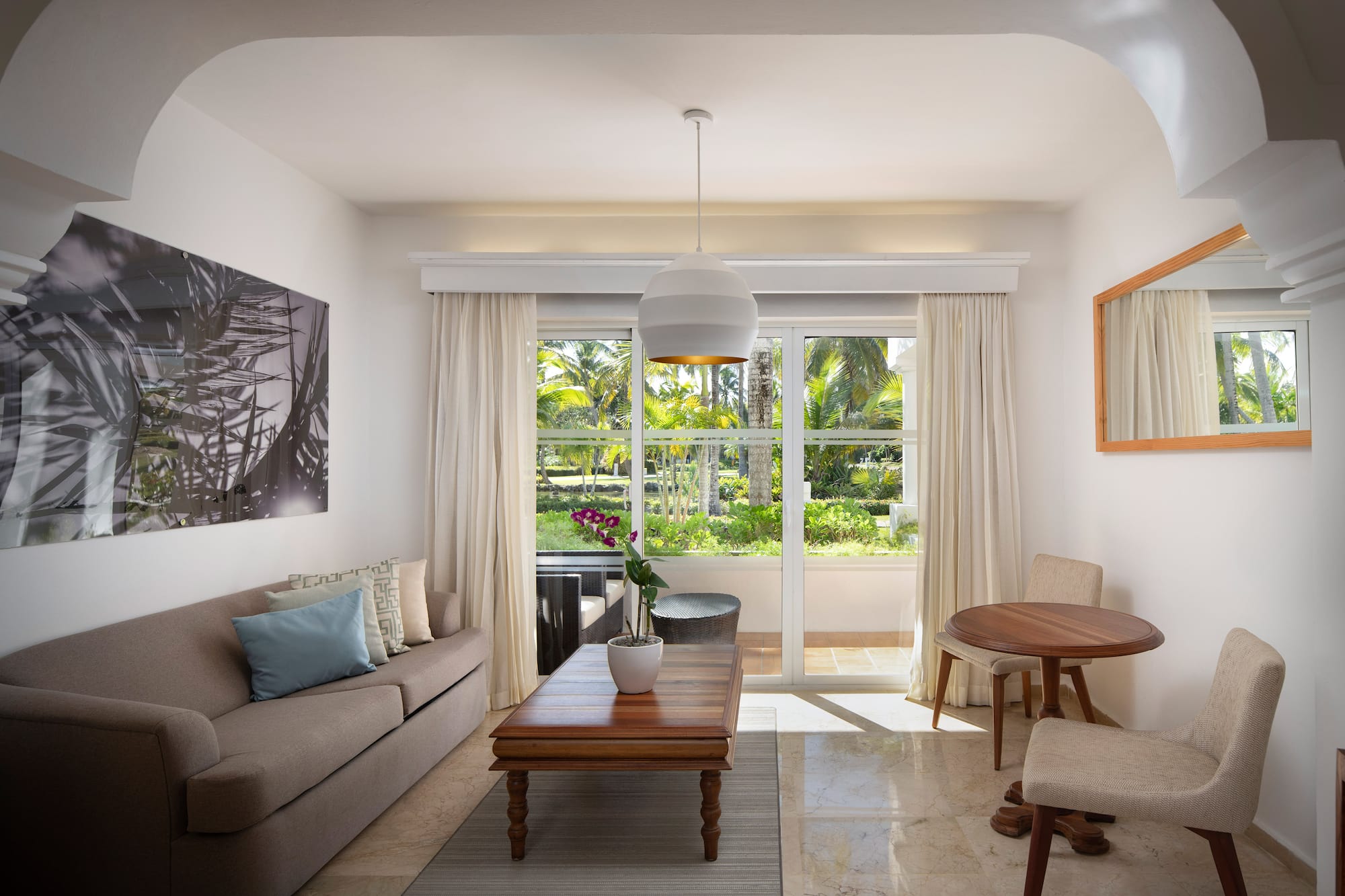a living room with a couch and table
