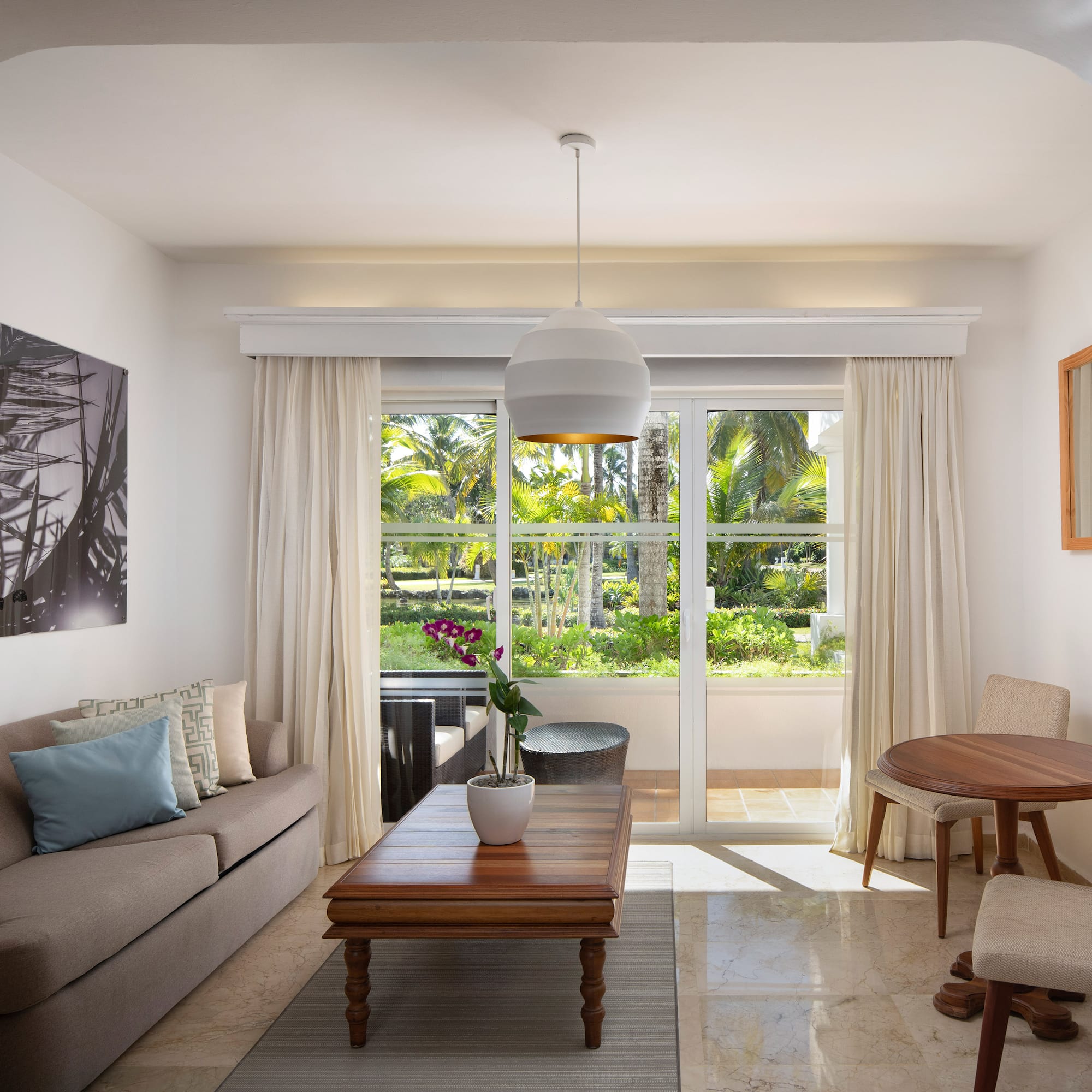 a living room with a couch and table