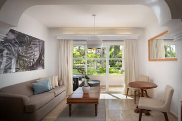 a living room with a couch and table