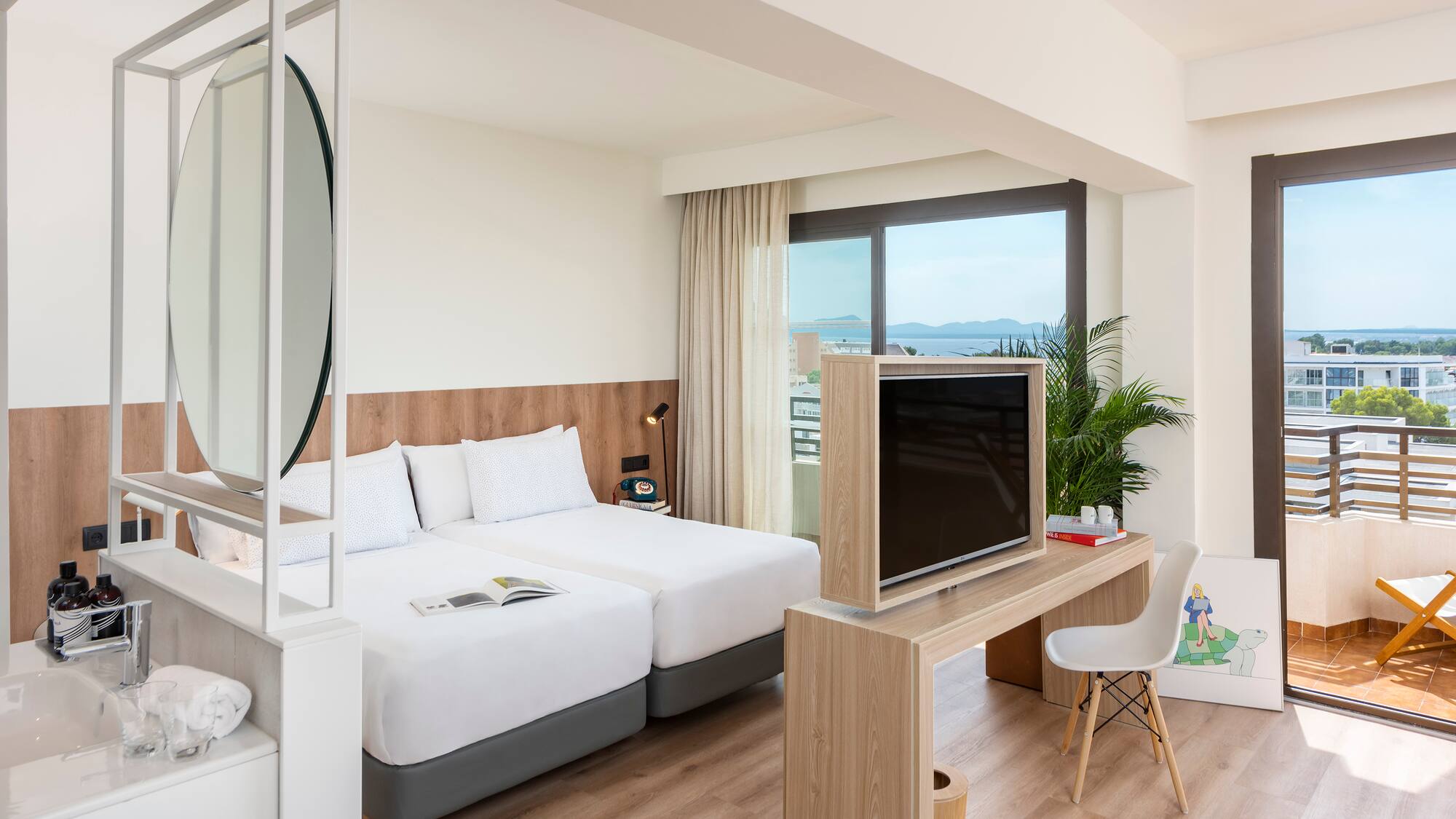 a room with a television and a bed