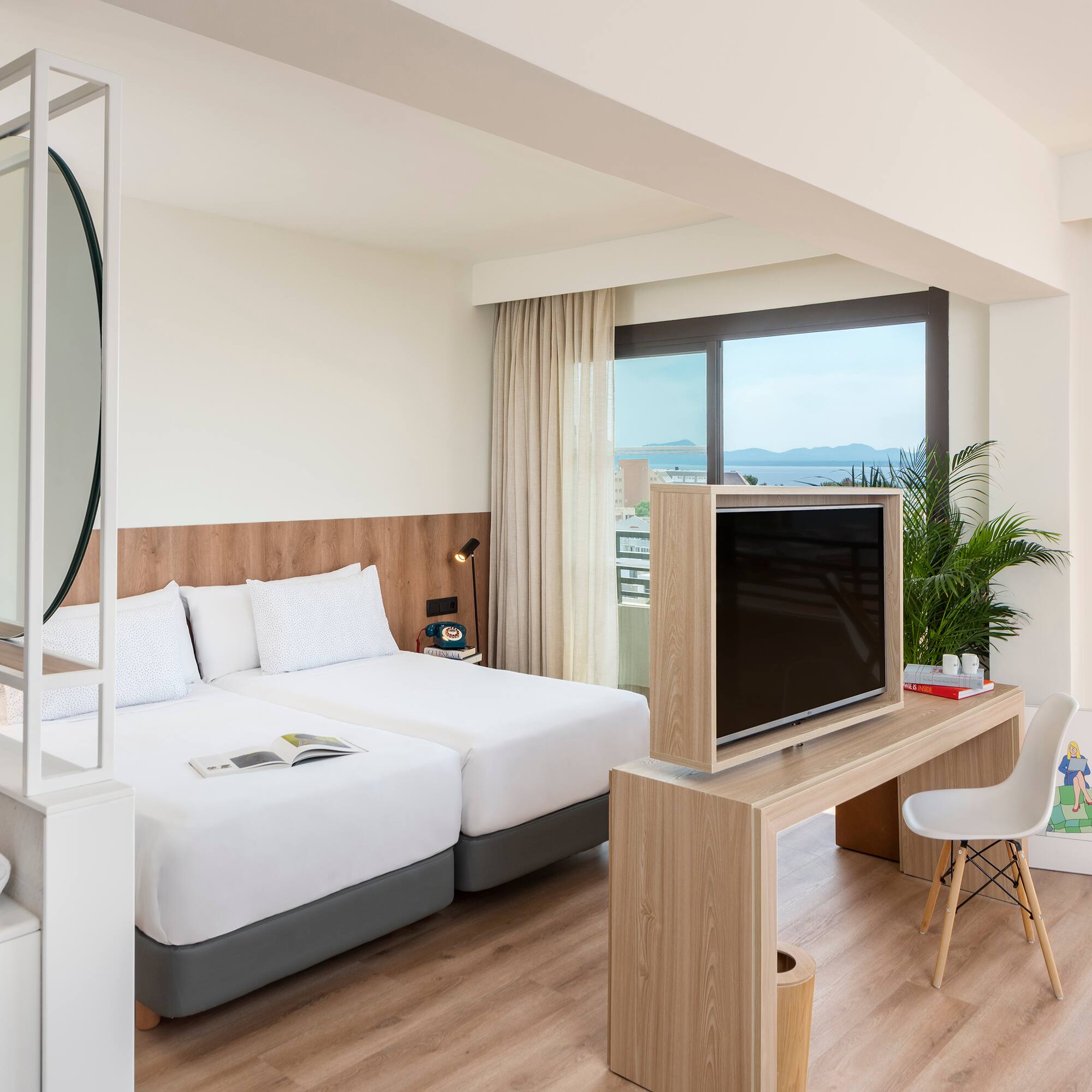 a room with a television and a bed