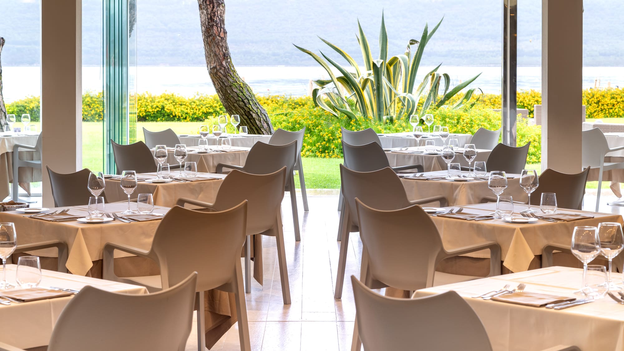 a restaurant with tables and chairs