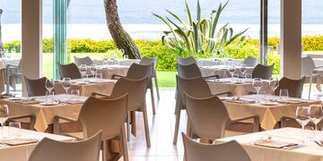 a restaurant with tables and chairs