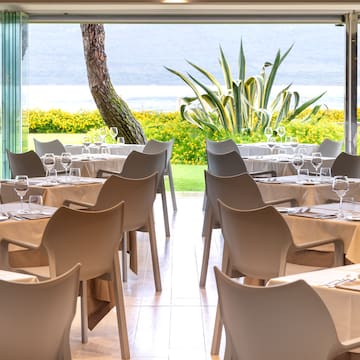 a restaurant with tables and chairs