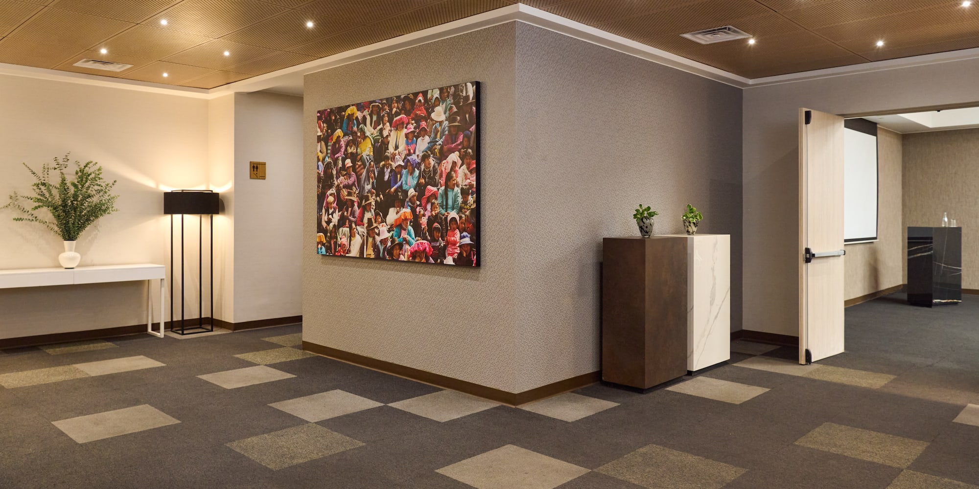 a room with a painting on the wall