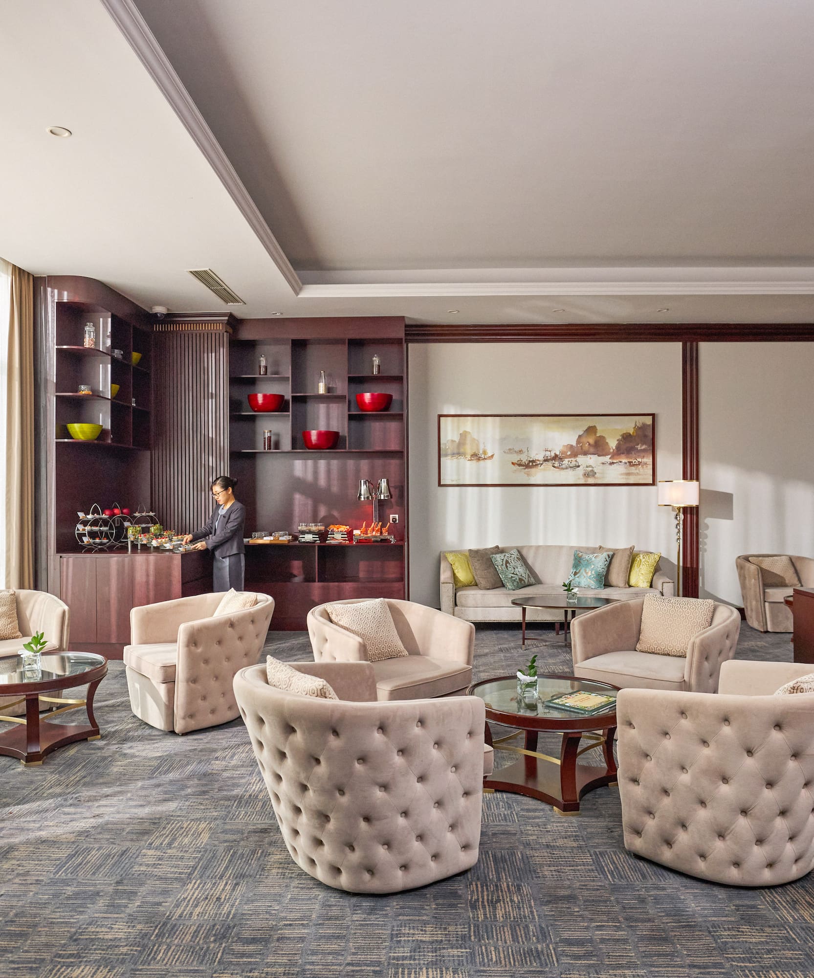 a room with a man standing in the background