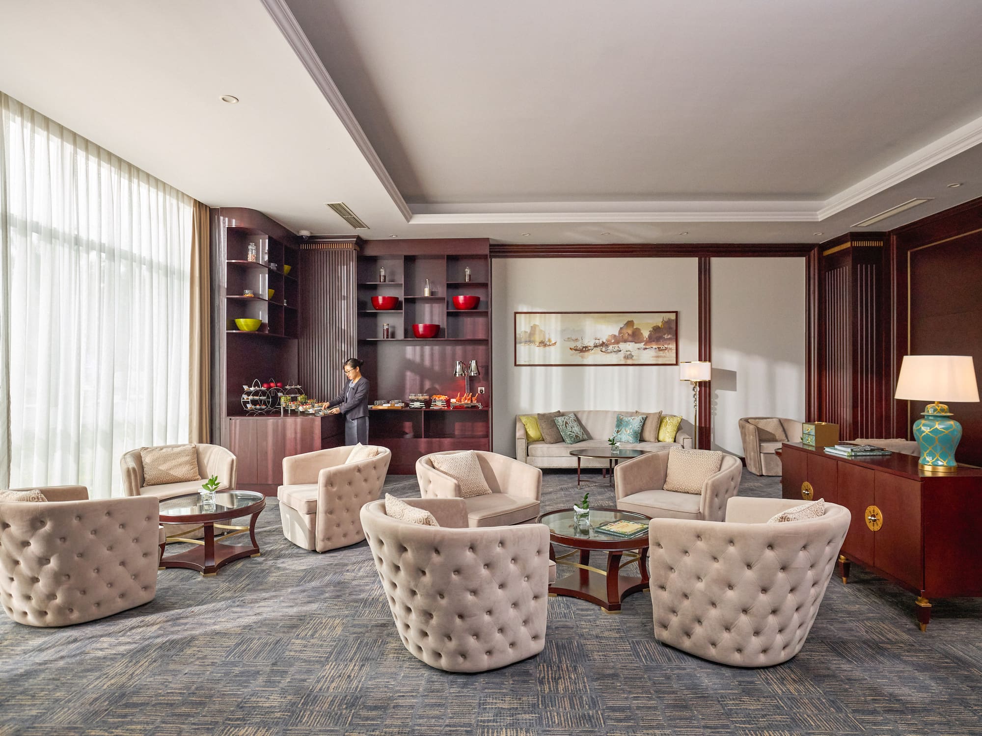 a room with a man standing in the background