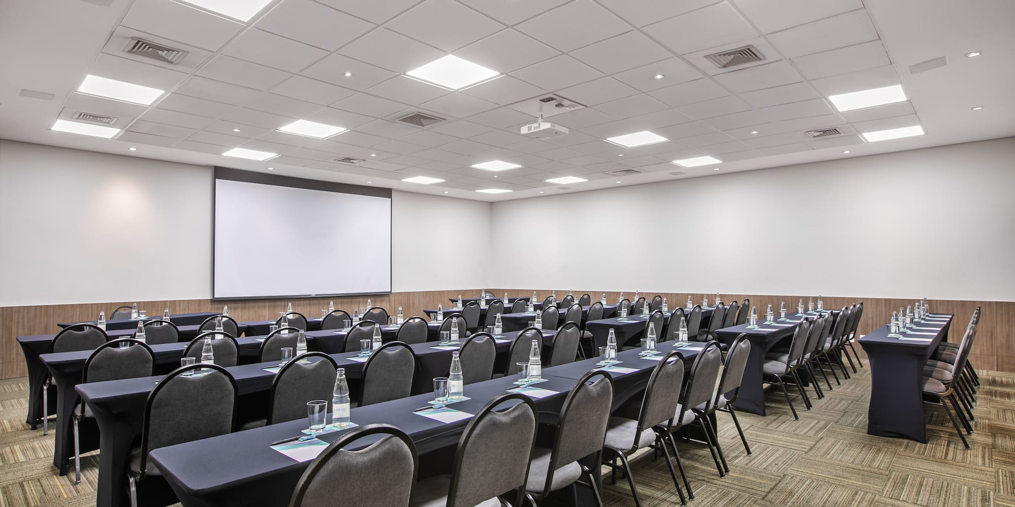 a room with tables and chairs