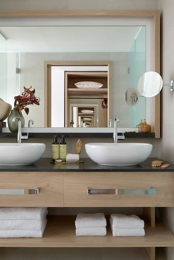 a bathroom with two sinks
