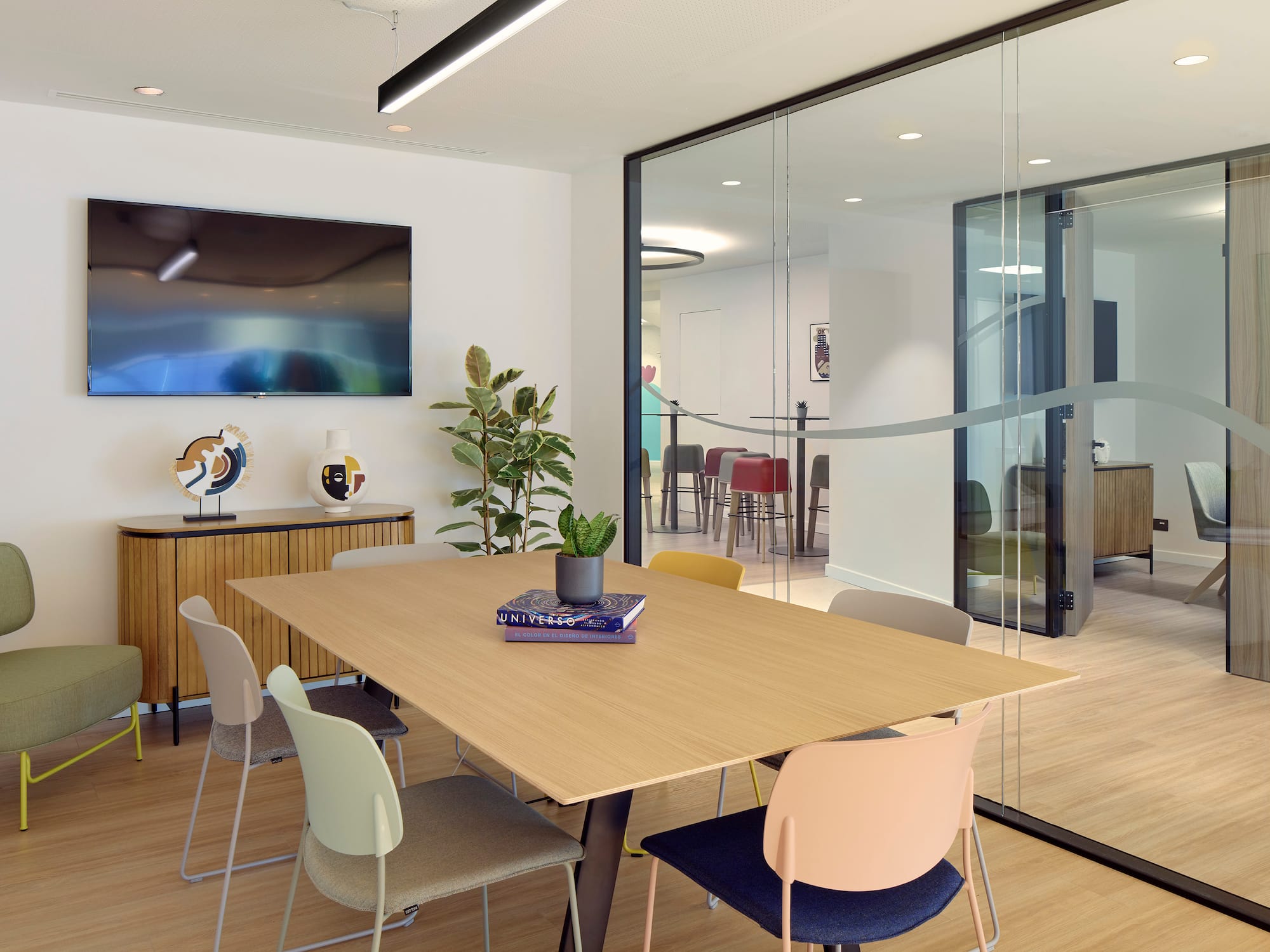 a room with a table and chairs