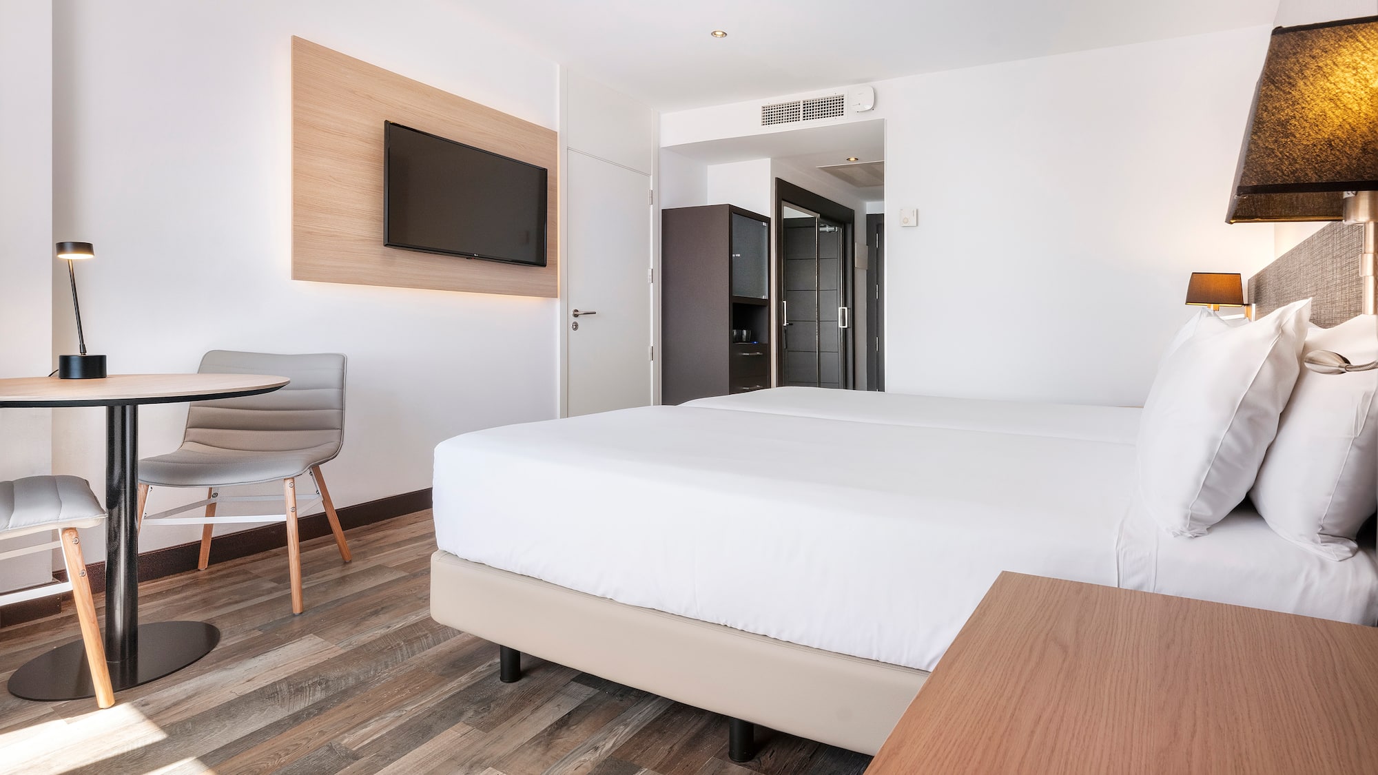 a room with a bed and a table