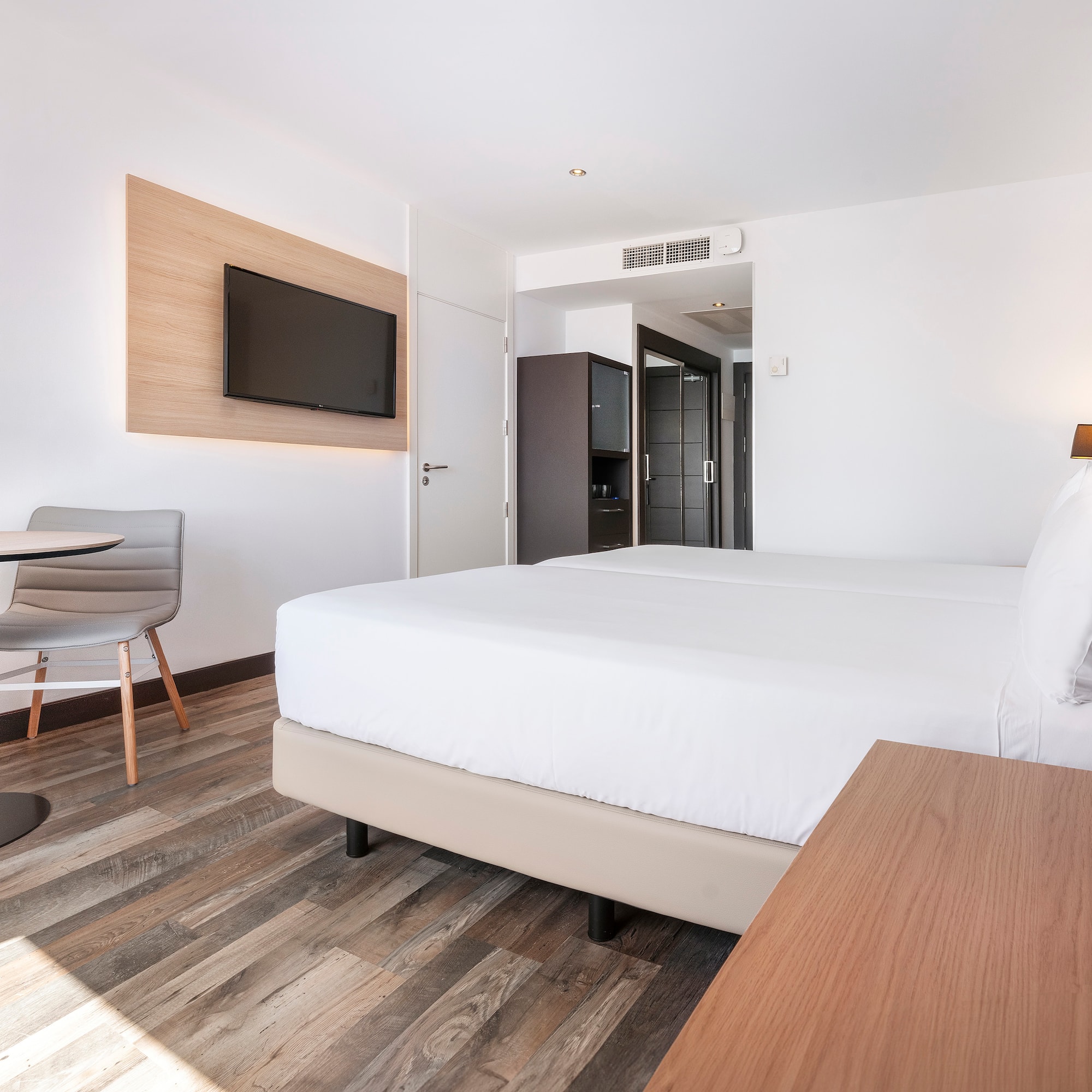 a room with a bed and a table