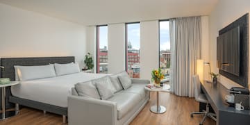 a room with a bed and a desk