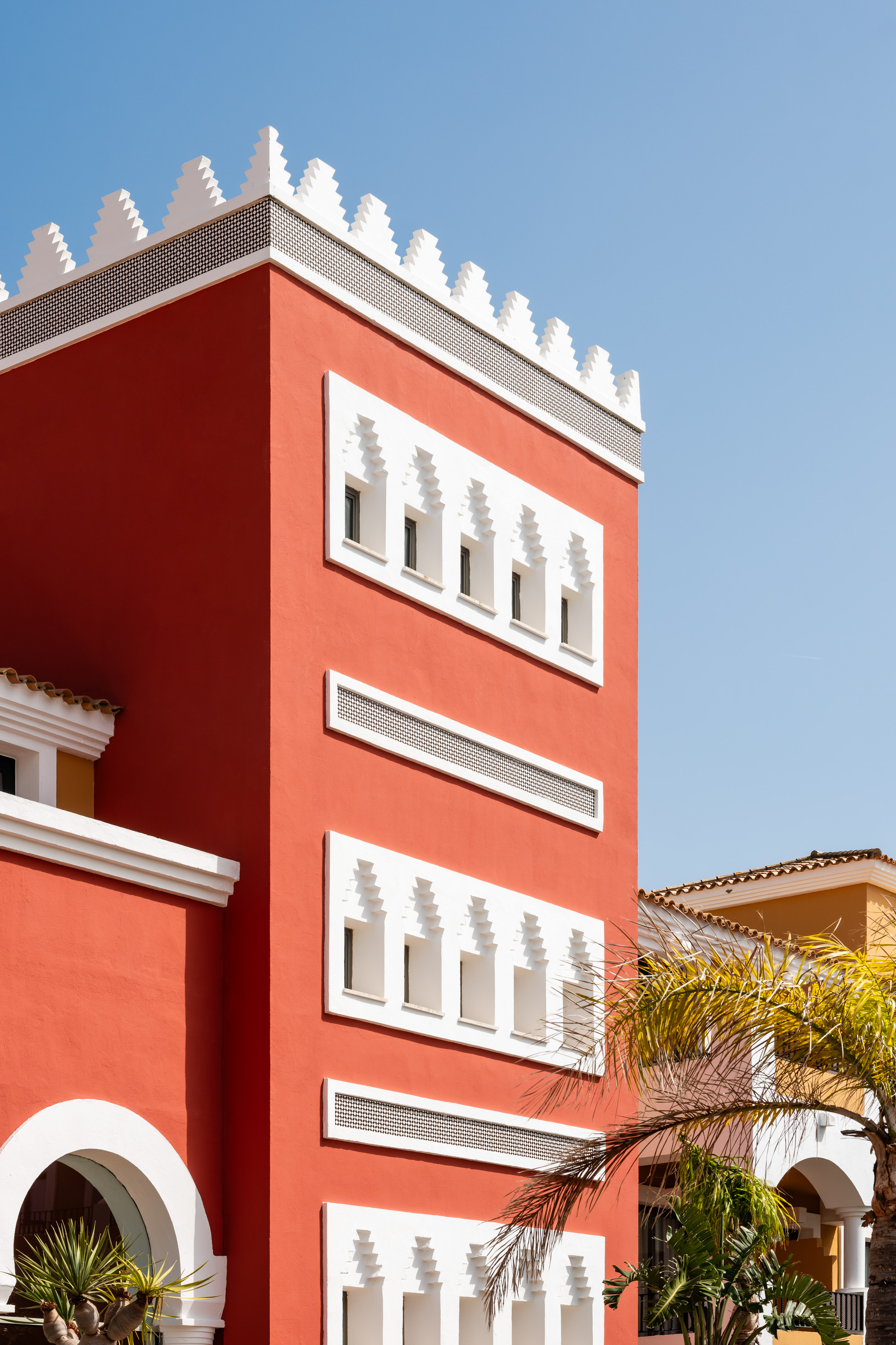 a red building with white trim