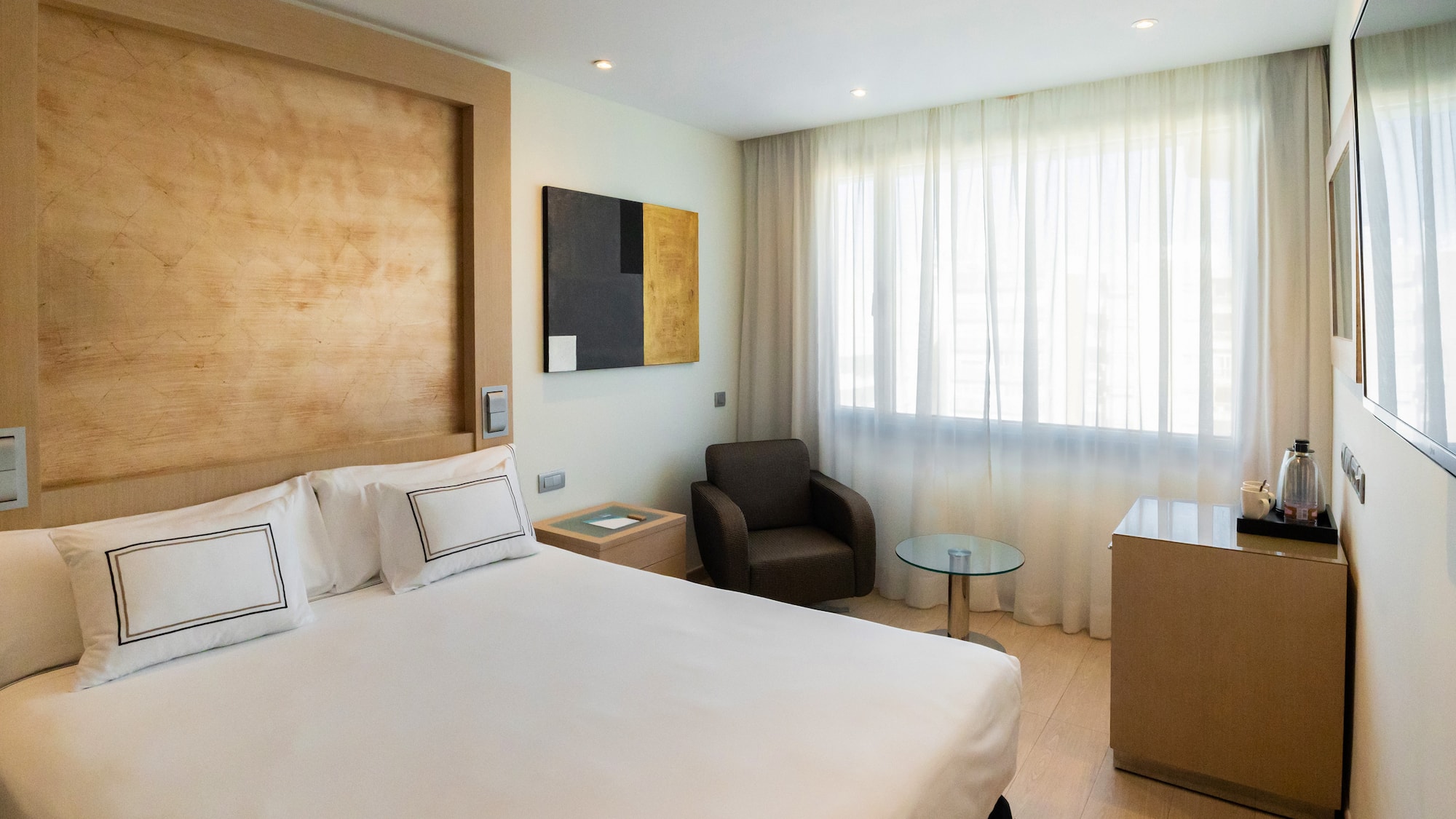 a room with a bed and a chair