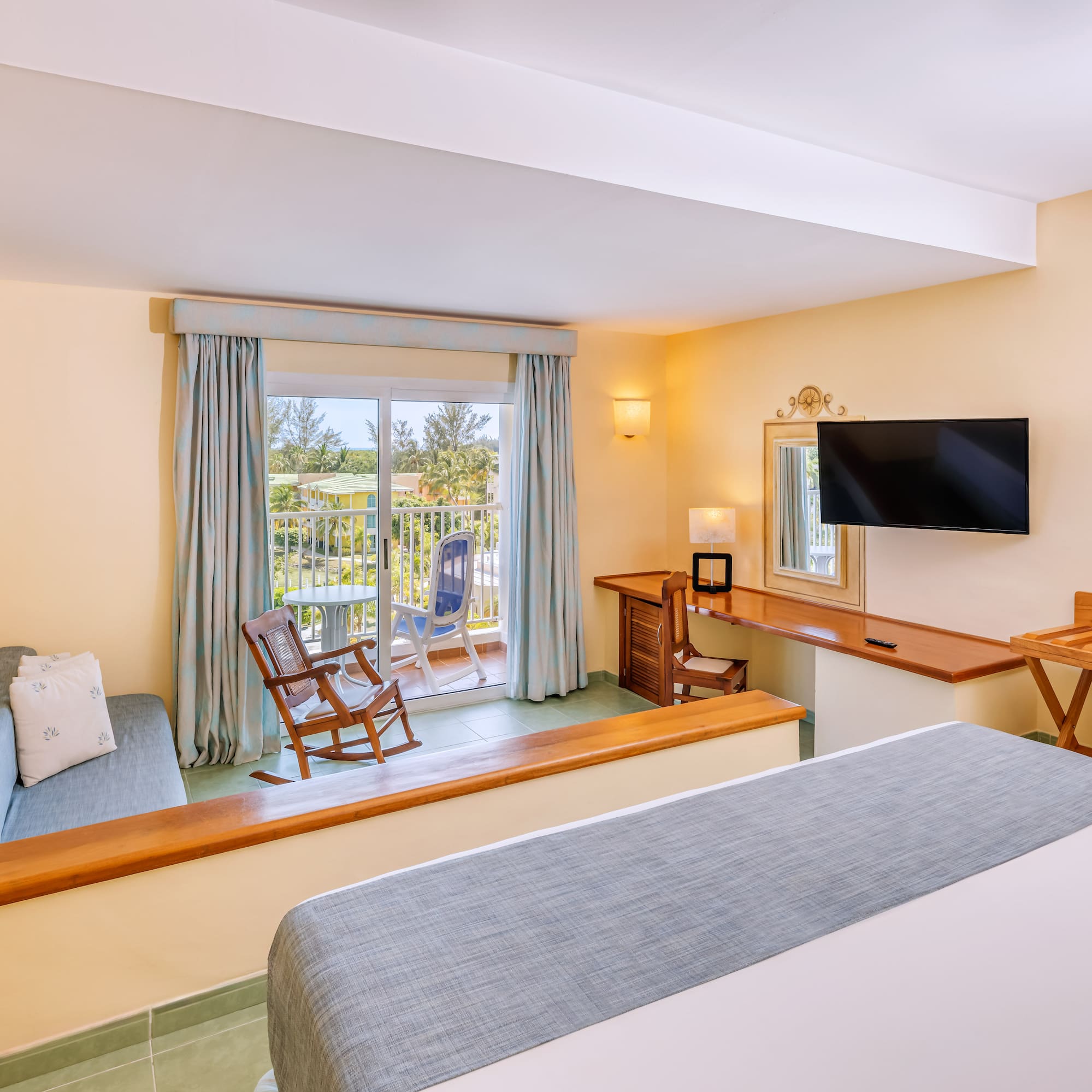 a room with a television and a couch