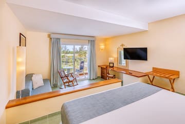 a room with a television and a couch