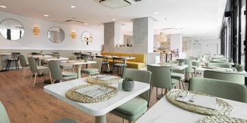 a room with tables and chairs