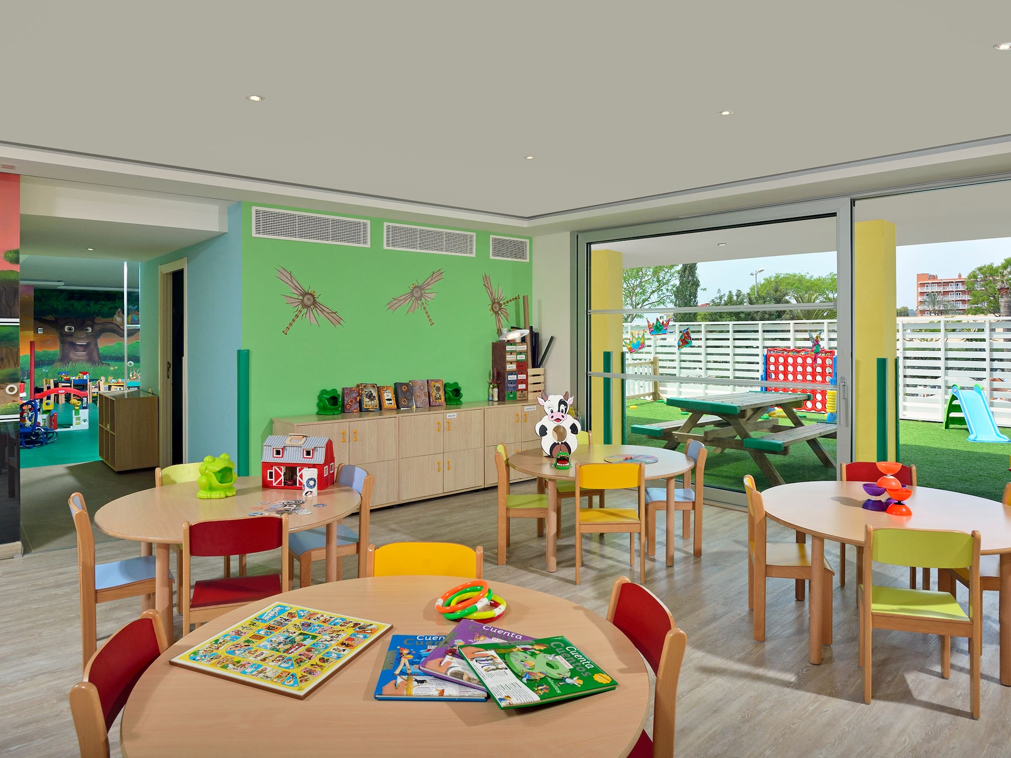 a room with tables and chairs