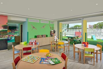 a room with tables and chairs