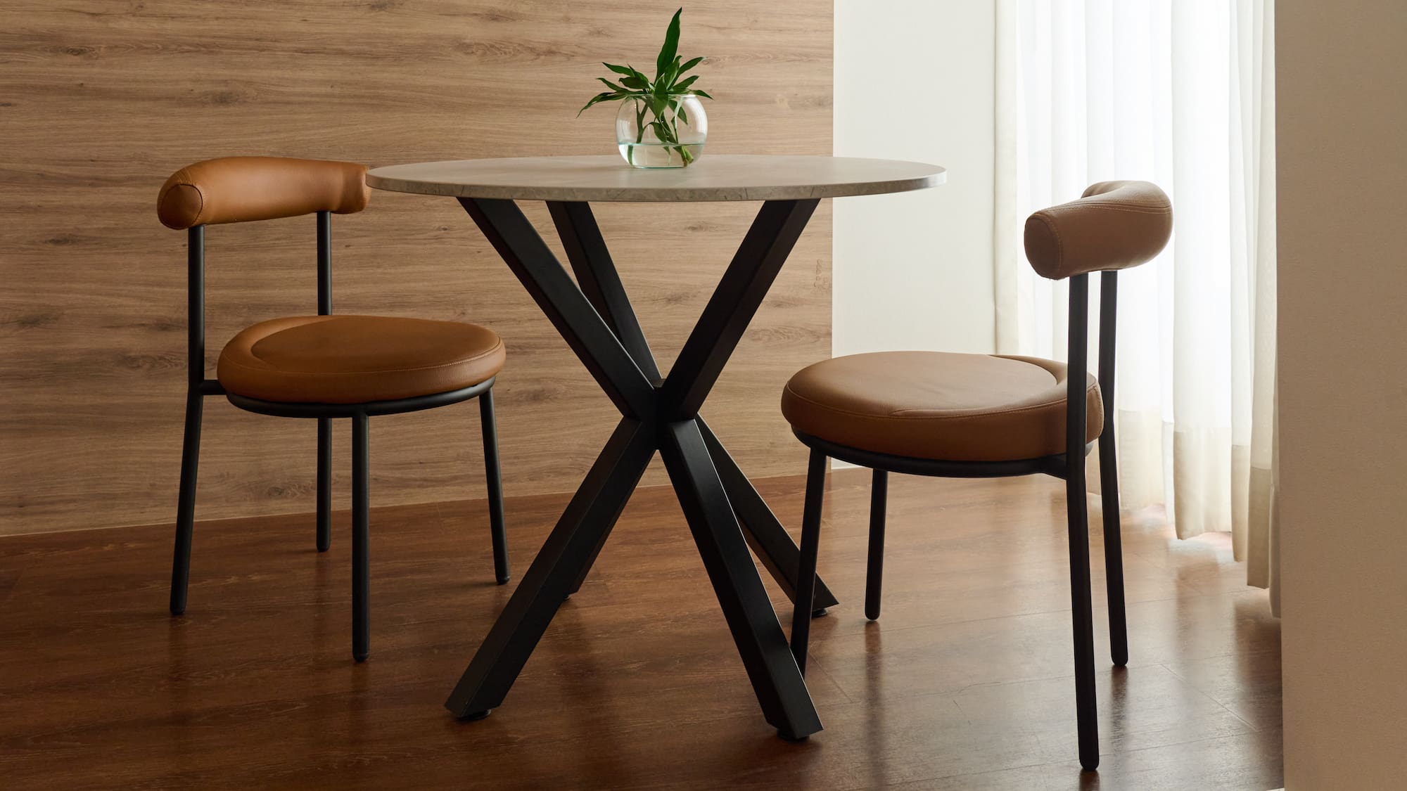 a table with chairs in a room