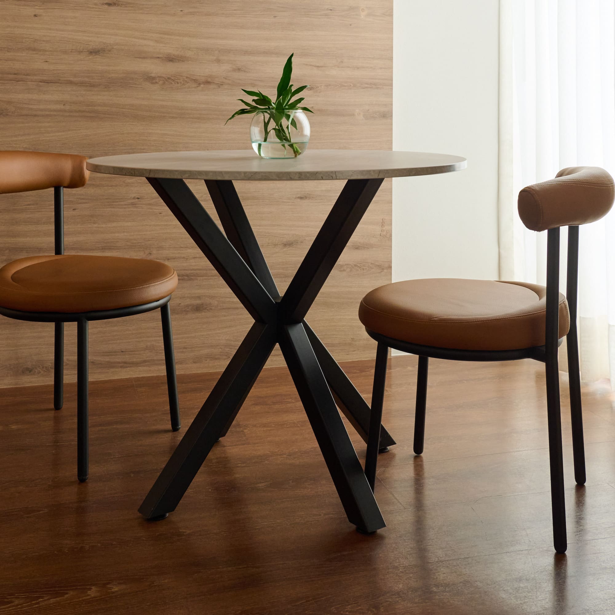 a table with chairs in a room