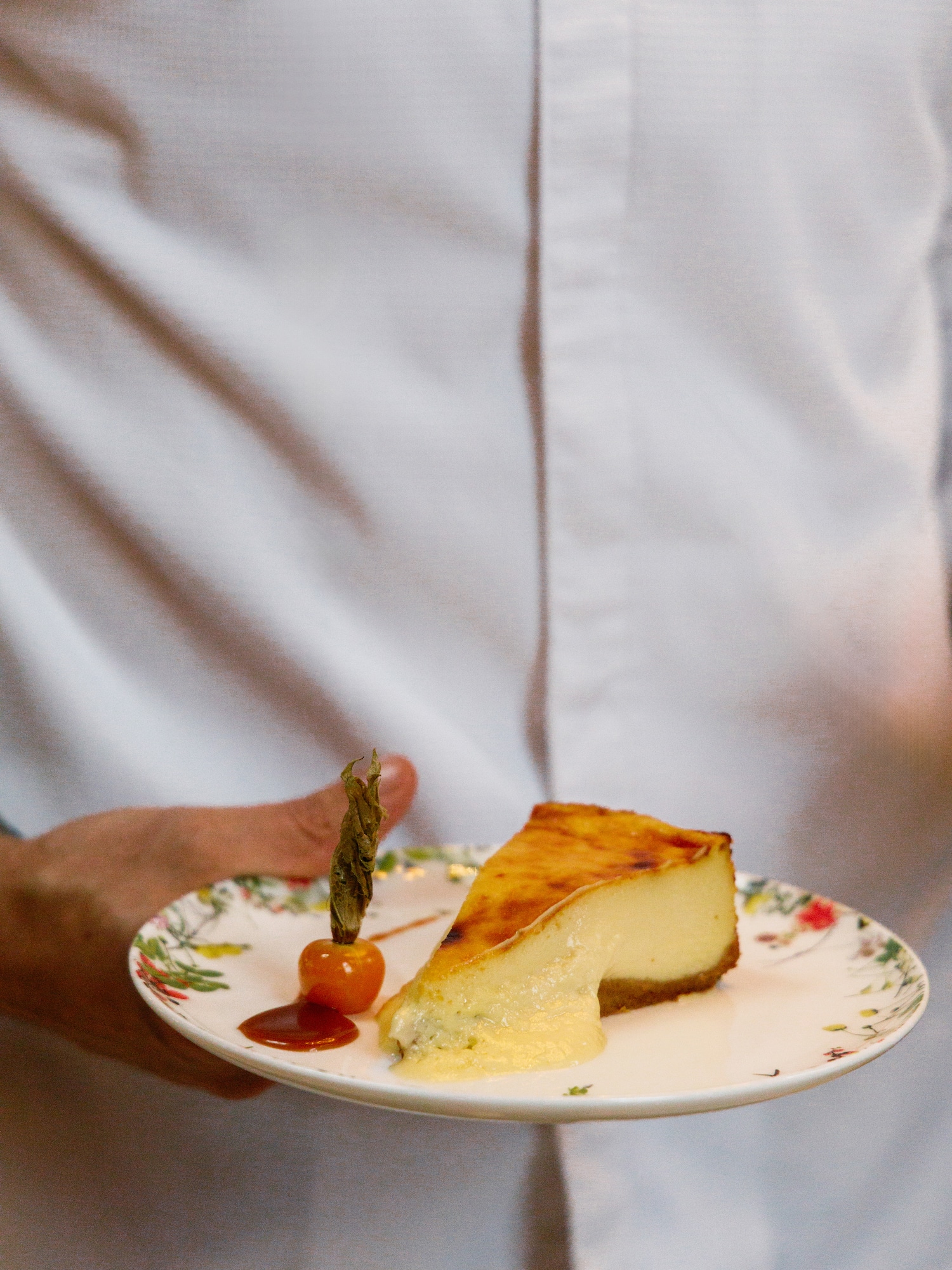 a person holding a plate of food
